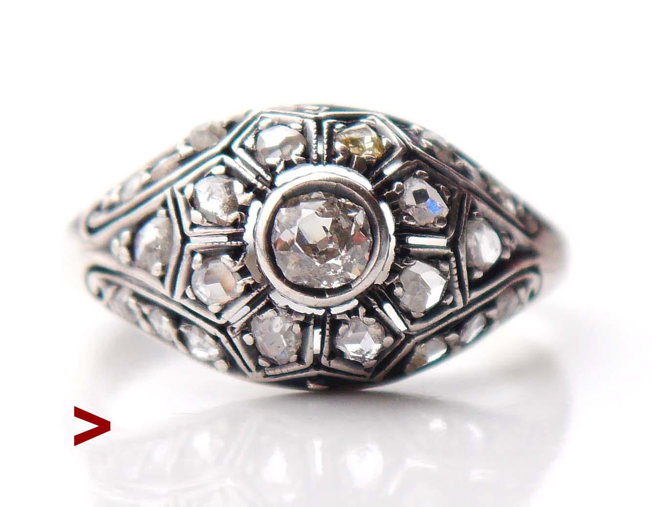 Unusual Antique Diamond ring with all metal parts in solid Silver. Very likely Russian made, I got it together with many Russian made items that date to late Imperial period.

Not hallmarked, made ca. late XIX - early XX century. Crown 16 mm x 10 mm