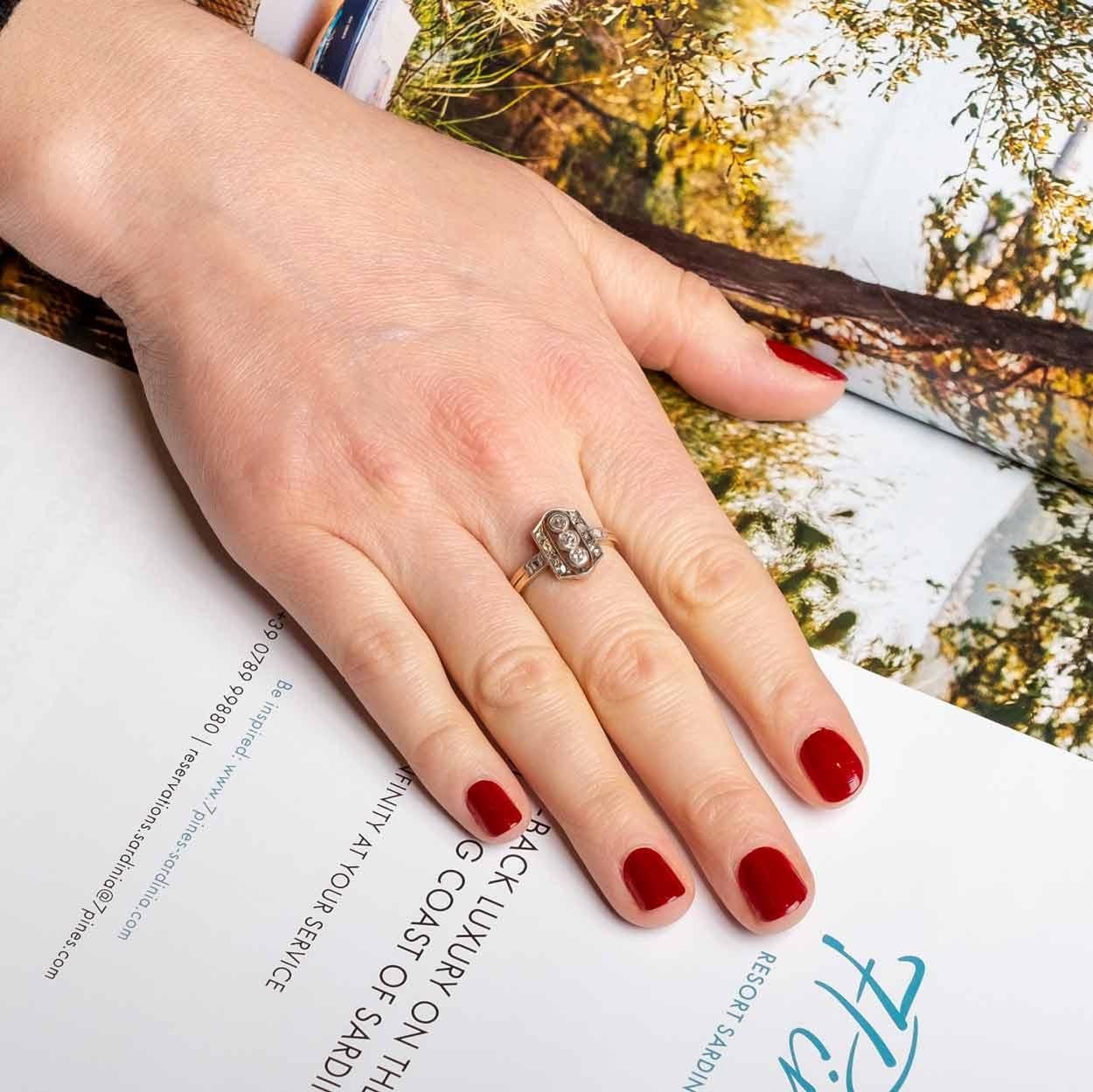 Antique ring set in 14 ct gold and silver with rose cut and old mine cut diamonds. Stamped from the Austro-Hungarian Empire 1872-1922.

Highlights:
- Austro-Hungarian Empire 1872-1922 stamp
- Gold and silver setting
- Rose cut and old cut