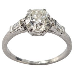 Antique Ring  Circa 1920  Old Cut Diamond 1.25 Cwt and two Baguette Platinum 950