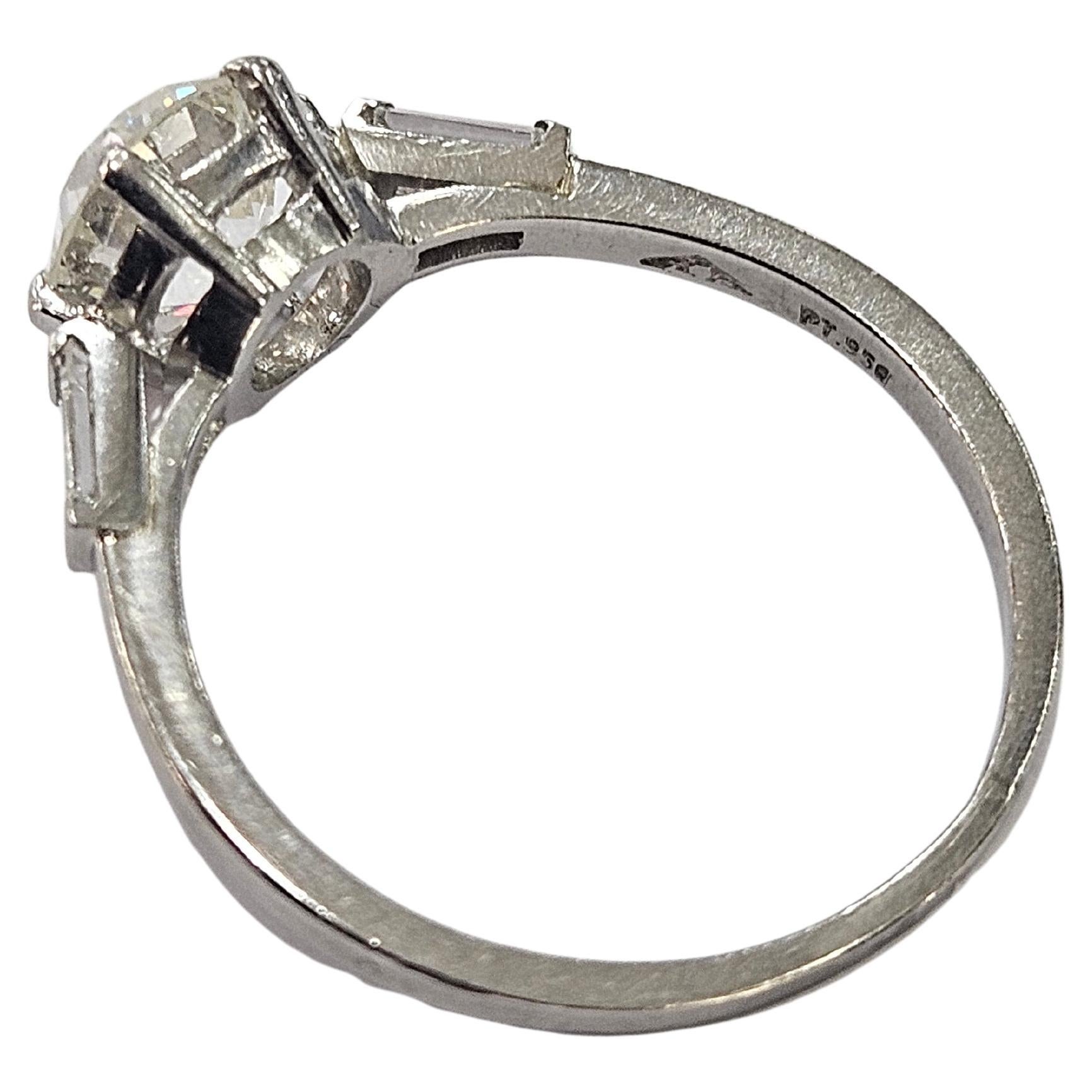 Old European Cut Antique Ring  Circa 1920  Old Cut Diamond 1.25 Cwt and two Baguette Platinum 950 For Sale