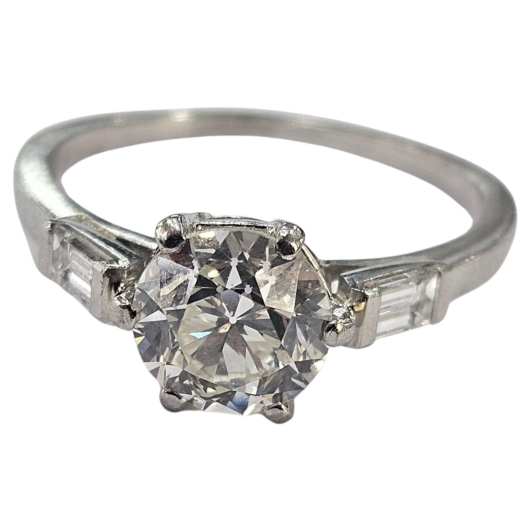 Women's or Men's Antique Ring  Circa 1920  Old Cut Diamond 1.25 Cwt and two Baguette Platinum 950 For Sale