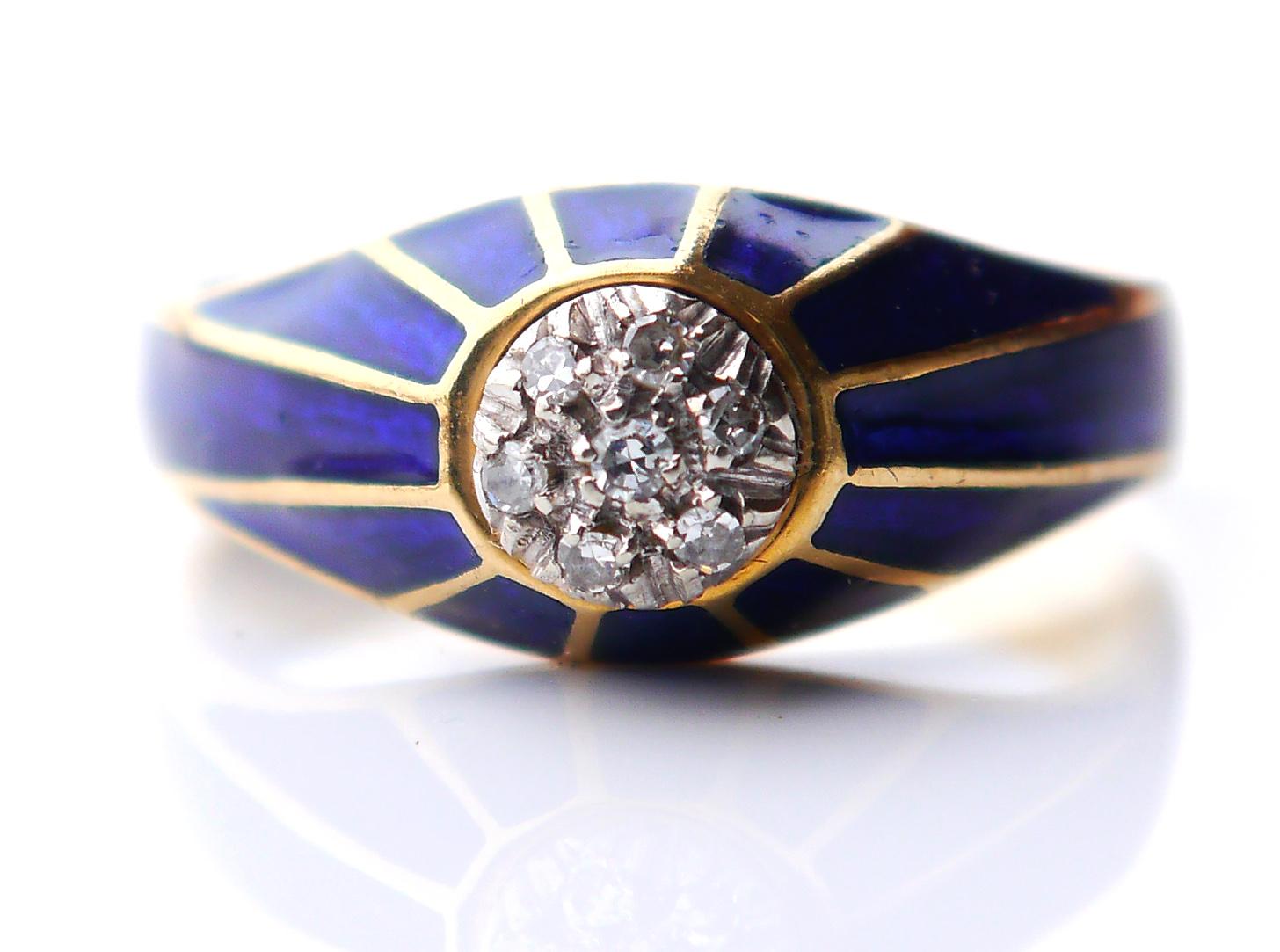 Great looking ring with an attached floret of seven old diamond cut Diamonds pave set in white Gold clusters and surrounded by 12 Blue Enamel panels smoothly conforming down the shoulders to a solid 18K Yellow Gold shank.

Diamonds Ø 1.5mm / 0.015ct