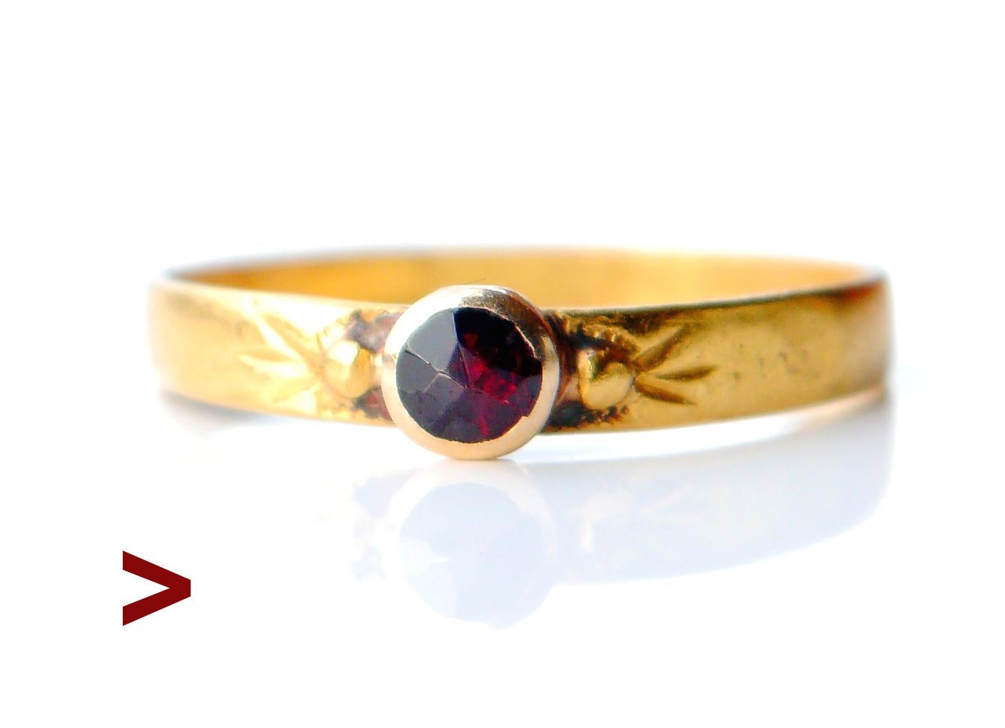 Fine Antique Ring in solid 23K Gold decorated with bezel set rose cut Ø 3.5mm/ 0.17ct.Garnet stone of pyrope variety with back side closed.

Ca. XIX - early XX cent. Worn Swedish hallmarks: 23K,three crowns and maker's.Year combination is too worn