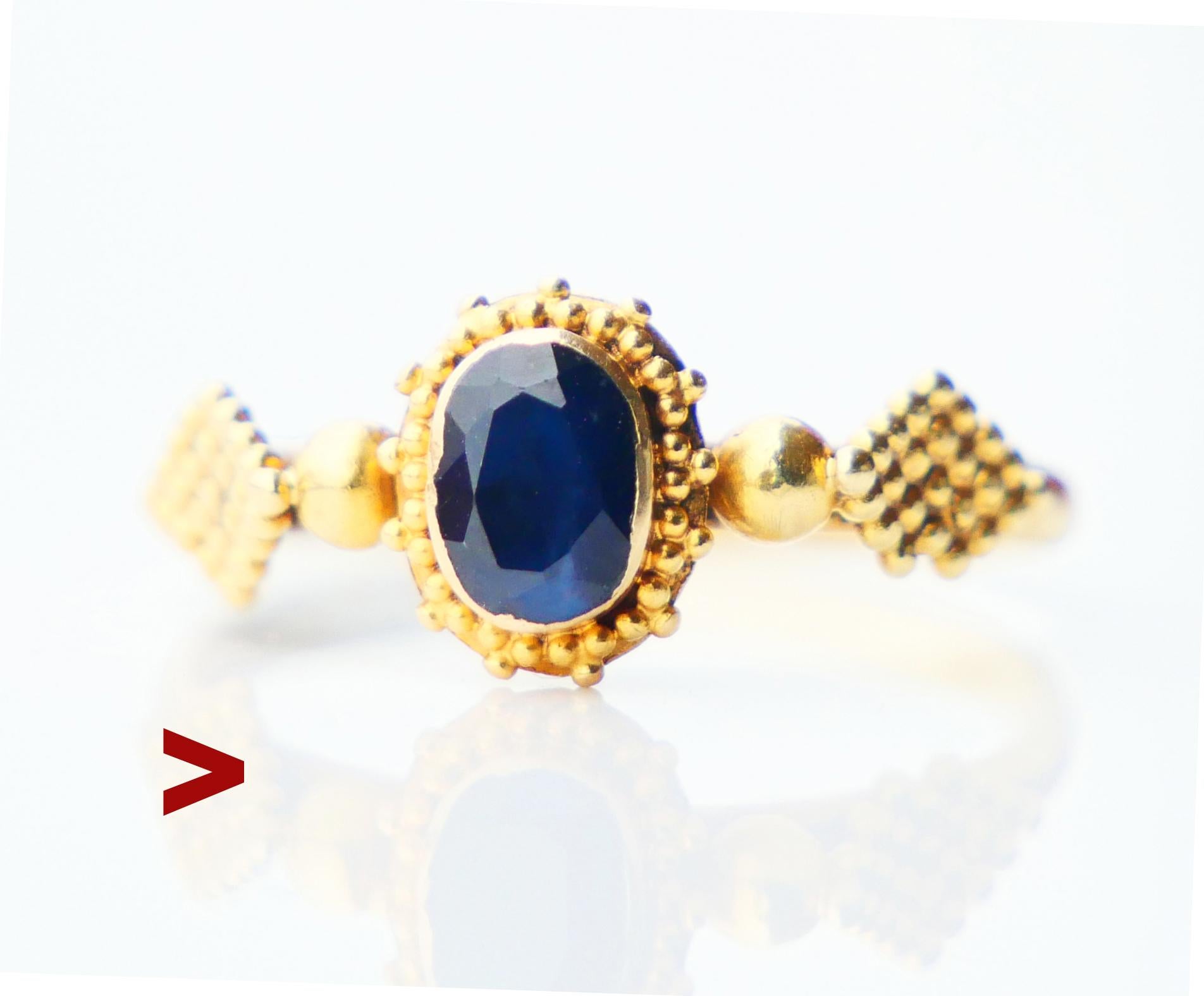 Ring for every day, band with granulation decor  in solid 18K Greenish Yellow Gold decorated with natural Blue Sapphire oval cut 5.5 mm x 4 mm  / ca. 0.4 ct  that demonstrates silk and color zoning even with back side closed. Medium Blue Color.