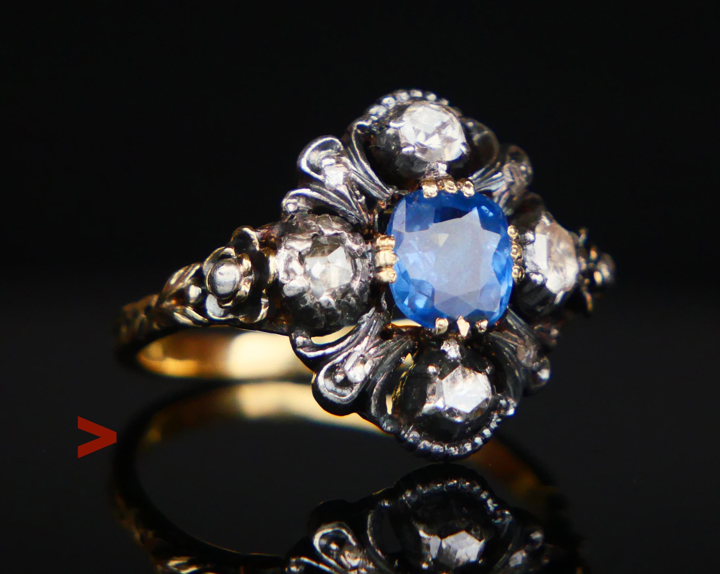 Nice Renaissance - styled cluster Ring with the carved band, shoulders, and parts of the crown in solid 18ct Yellow Gold holding natural Blue Sapphire stone and eight rose - cut Diamonds set in Silver clusters.

Ca. 1920s -1930s, likely  German ,