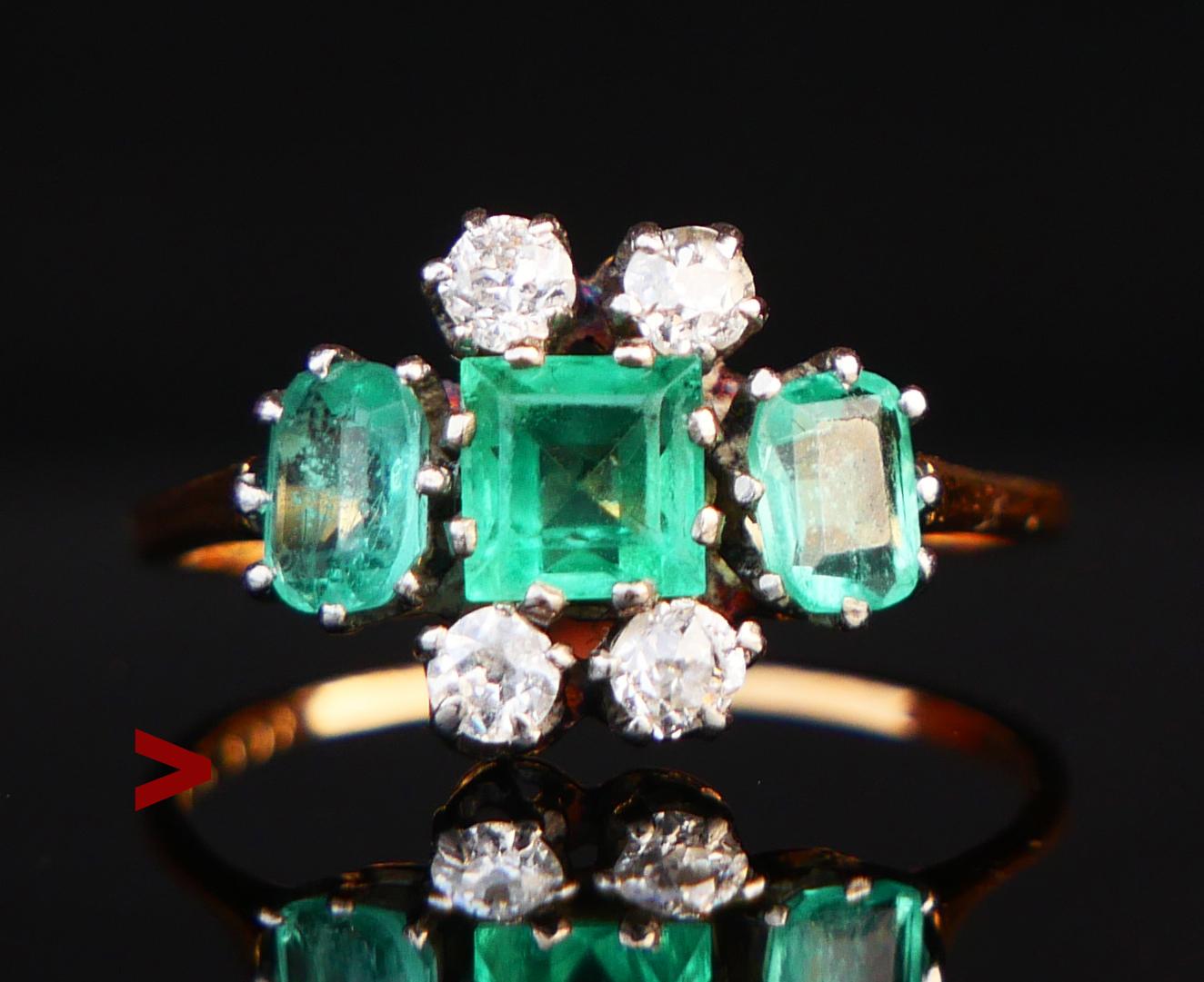 Beautiful cluster Ring in solid 18K Gold featuring three natural Green Emeralds and 4 old European cut Diamonds set in Platinum claws.

Swedish hallmarks, 18K, no year combination, hand-made ca. 1920s -1930s.

Crown measures: 19mm x 11mm x 5mm deep.