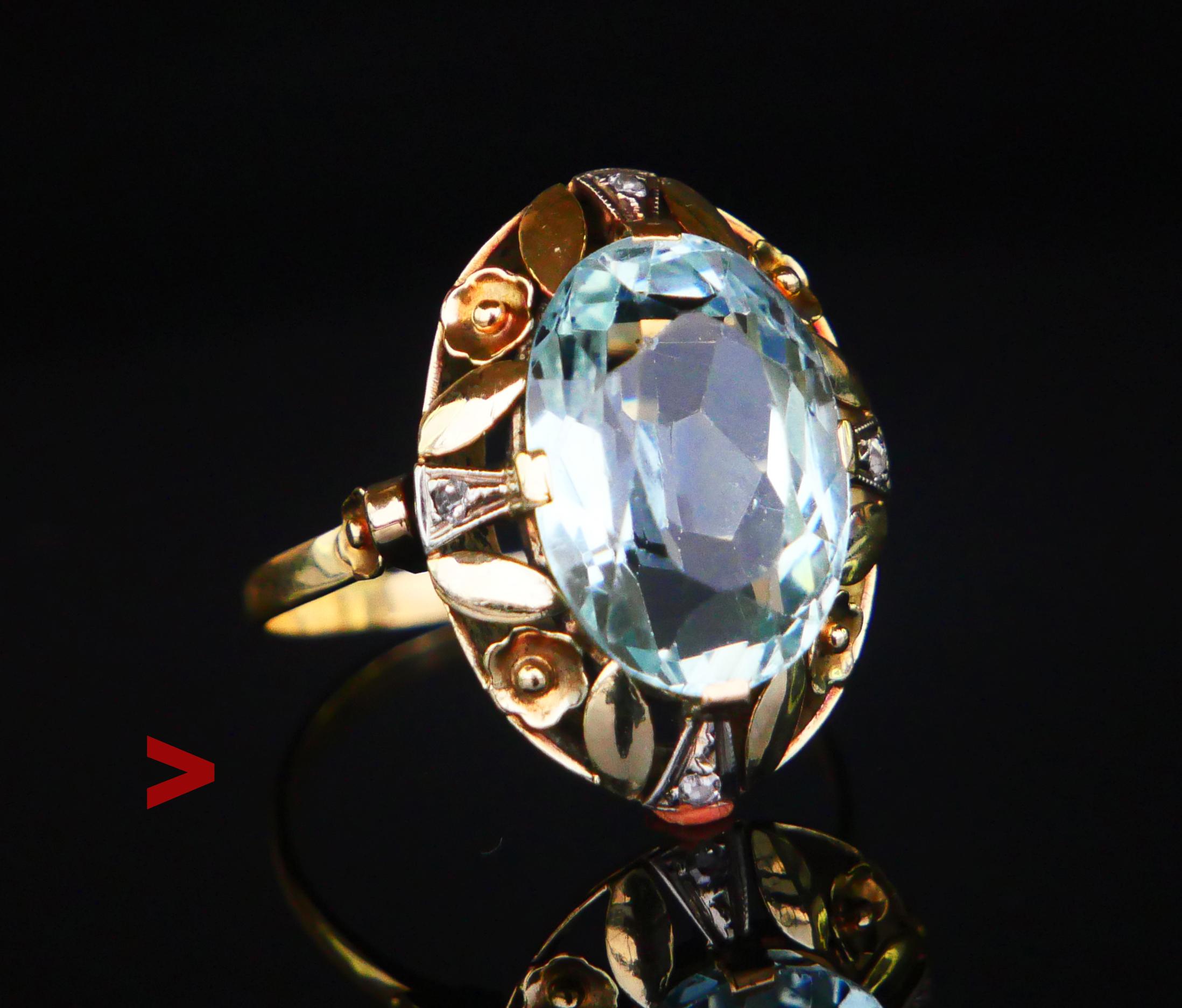 German ring hand - made ca. 1930s  in solid 14K Yellow and White Gold (or Platinum) with openwork crown 20 mm x 16 mm x 8 mm deep featuring natural transparent claw set Blue Aquamarine stone oval cut  15 x 10 x 7.5 mm  deep / about 6.5 ct. Color is