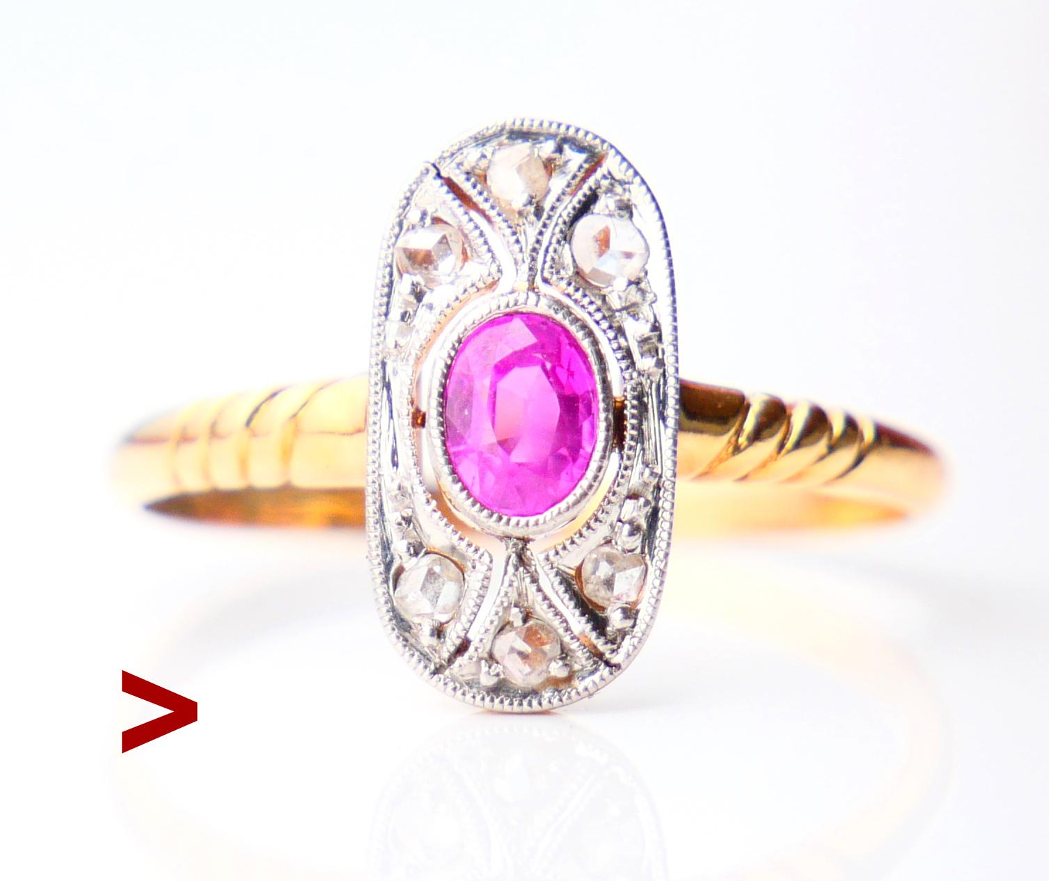 Fine cluster Ruby Ring made between ca.1900 -1930s. Combination of Gold, Platinum Ruby and Diamonds.

Platinum on Gold openwork crown 12 mm x 6 mm at axes x 3 mm deep with natural oval cut Ruby 4.5 mm x 3.5 mm / ca.021ct. and six rose cut Diamond