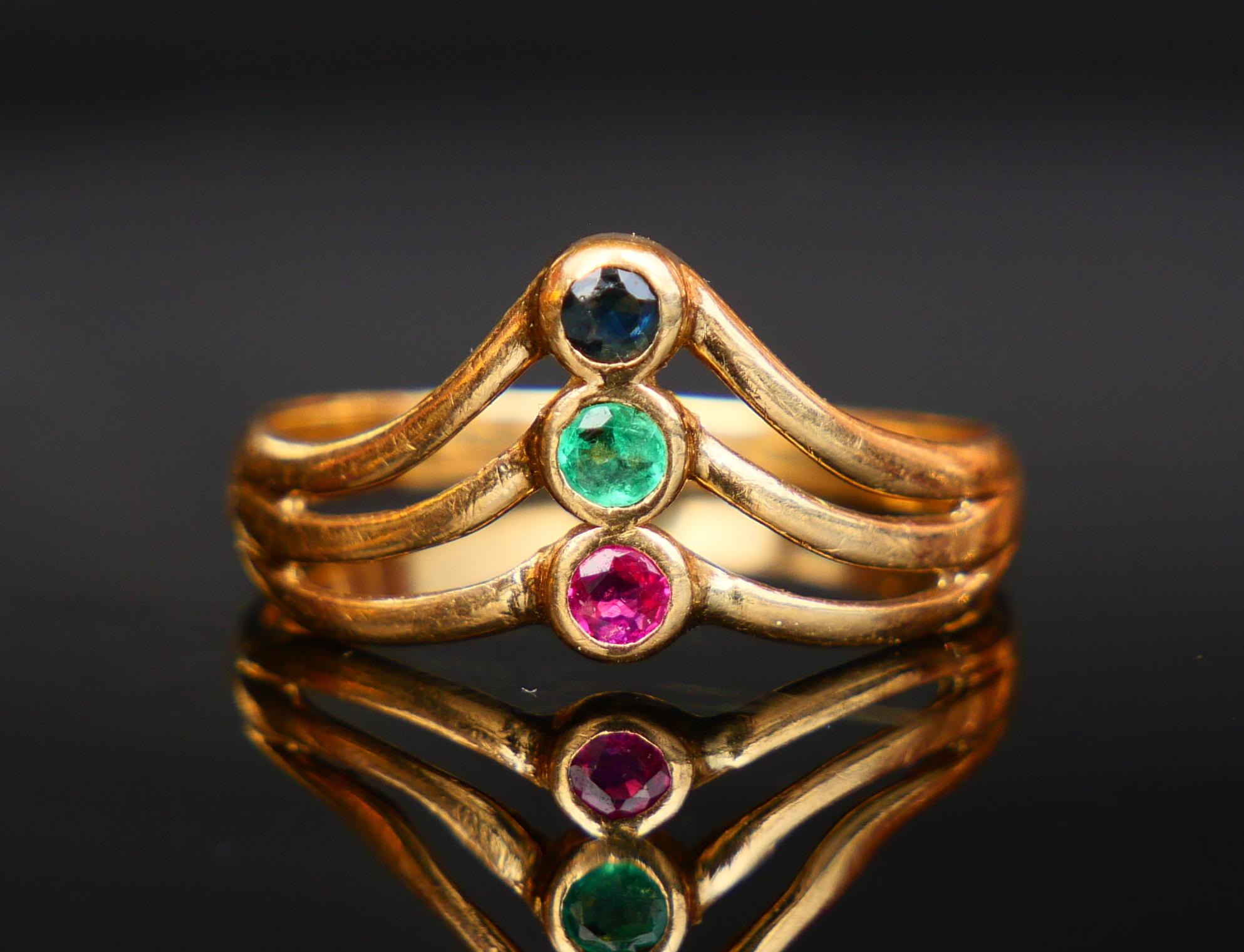 Ring for every day in solid 18K Yellow Gold decorated with 3 natural stones : Red Ruby, Green Emerald and Blue Sapphire of old European diamond cut Ø 2.5 mm / ca. 0.1 ct each . Total weight : ca. 0.3 ctw. All stones with open backs.

Crown is 9.5 mm