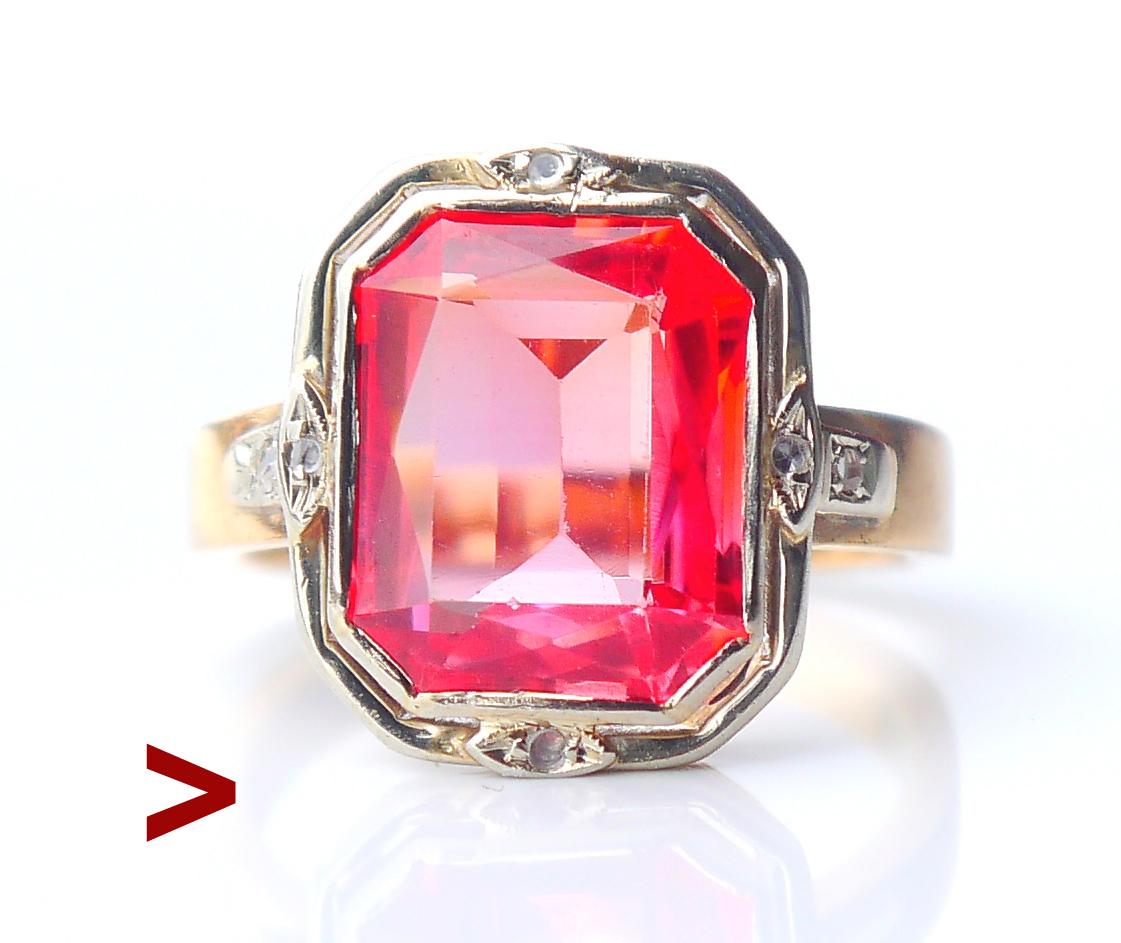 A Ring with crown in White Gold or Platinum on solid 18K Yellow Gold band holding lab -made Red - Pink Ruby accented with 6 rose cut Diamonds.

Hallmarked / tested 18K. European made ca. 1900 s - 1930s.

Ruby is emerald cut with beautiful table and