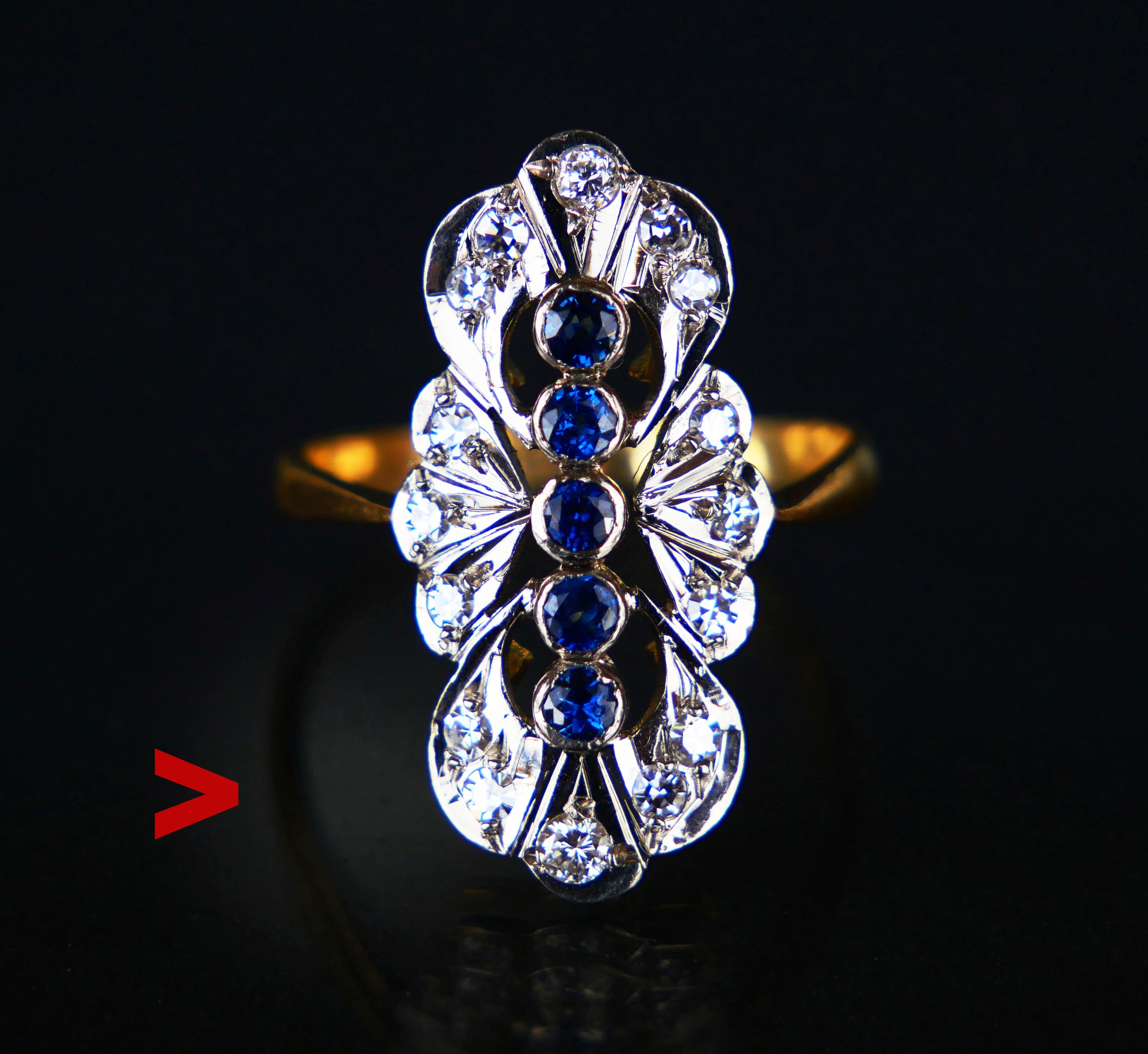 This ring has a beautiful arrangement of natural Sapphires and Diamonds set on an openwork navette or boat-shaped crown with Platinum clusters melted into a solid 18K Yellow Gold base.

Swedish import hallmarks, hallmarked 18K. This ring dates to