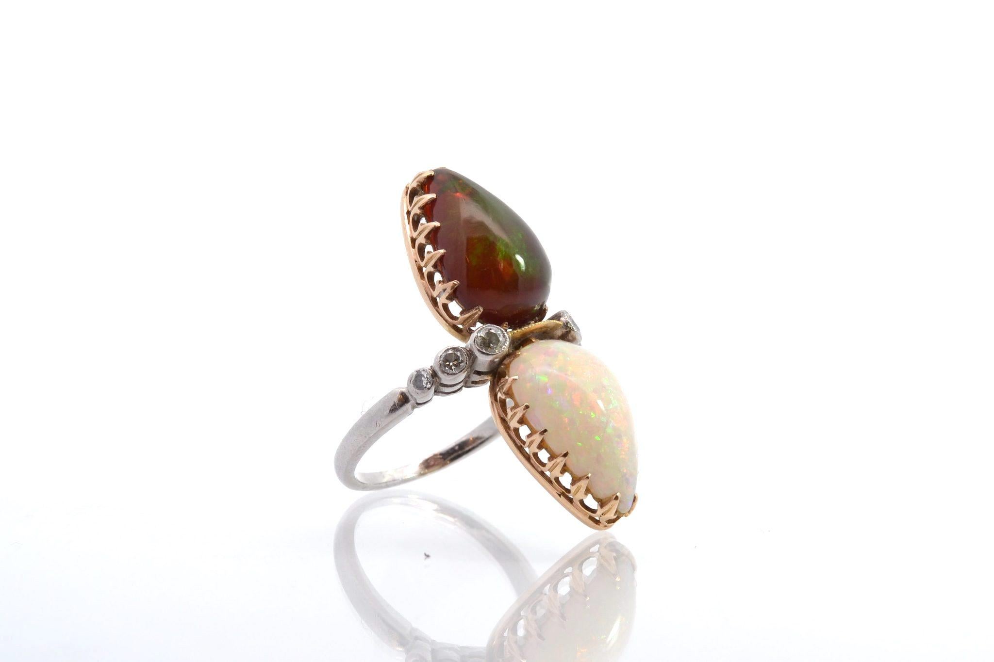 Stones: opals and old cut diamonds
for a total weight of 0.18 carats.
Material: 18k yellow gold and platinum
Dimensions: 3.4 cm length on finger
Weight: 7.6g
Size: 52 (free sizing)
Certificate
Ref. : 24799