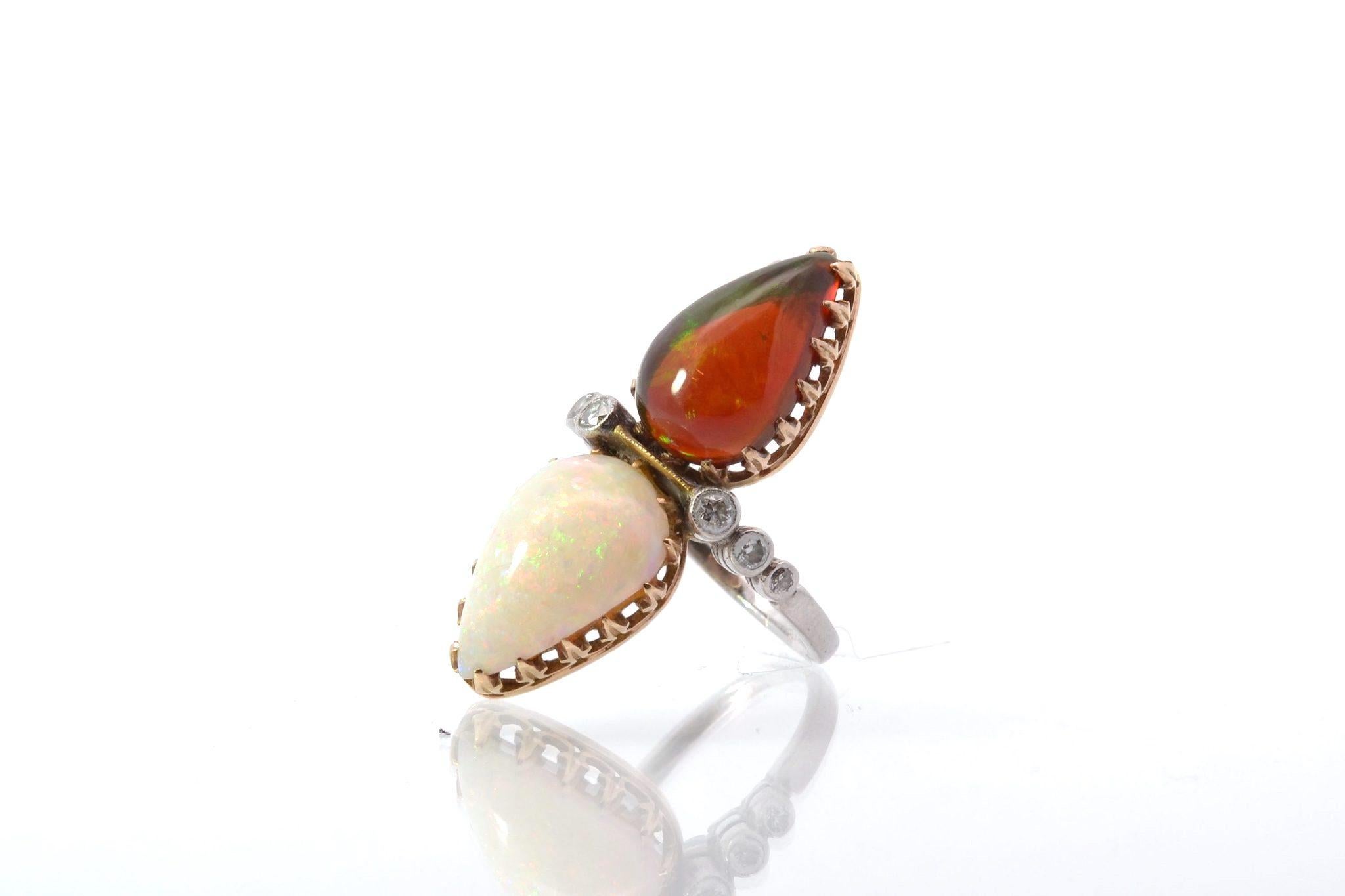 Cabochon Antique ring with 2 opals and old cut diamonds For Sale