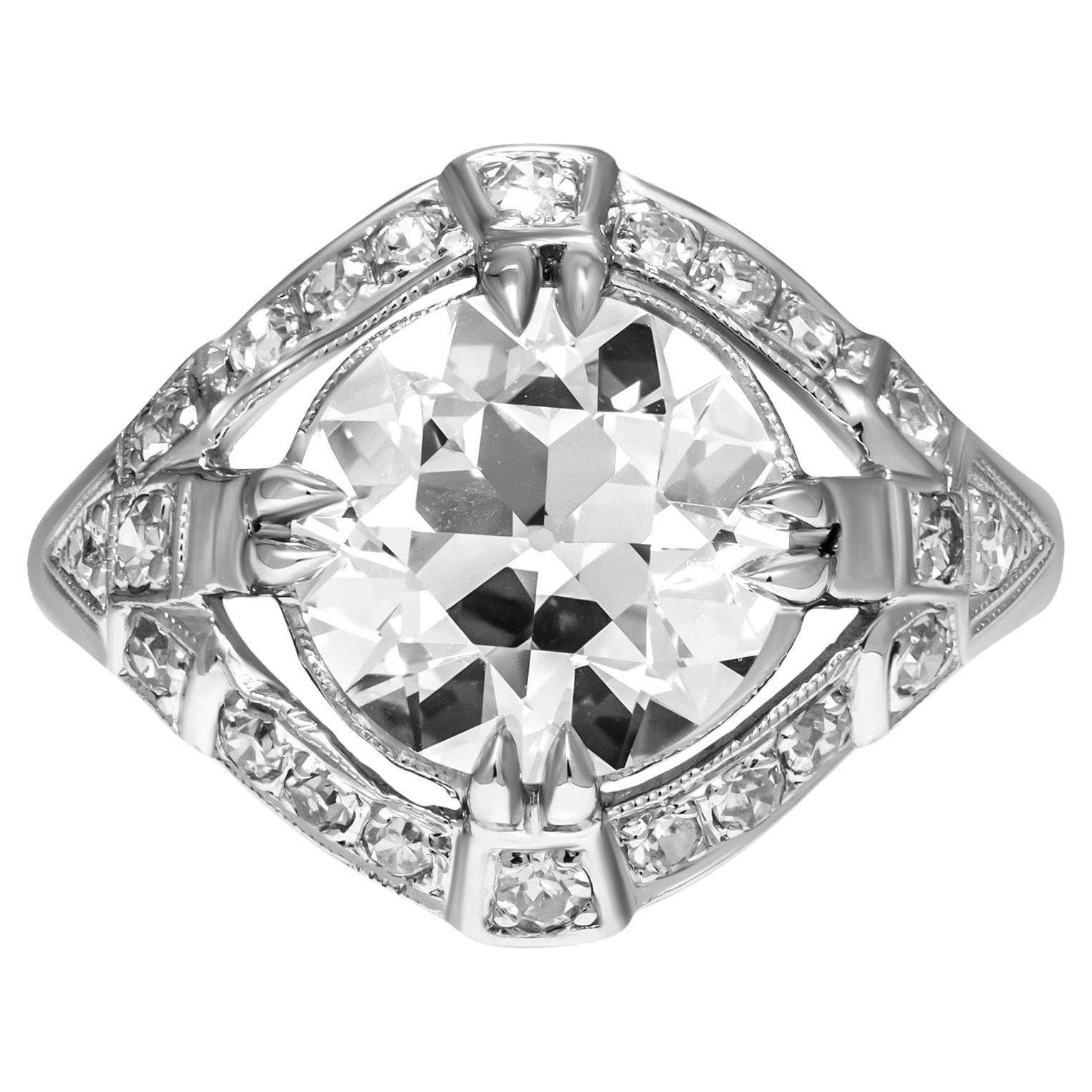 Antique Ring with 3.06ct Old Euro Cut Diamond in Platinum
Featuring Millgrain Pave work totaling aprox. 1.5ct F color VS clarity stones;
Mounted in Platinum 950;
Center Stone: 3.06ct F VVS2 Old European Cut Diamond GIA#5181843912
