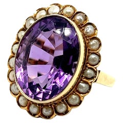 Antique Ring with Amethyst and Pearls in 18 Karat Yellow Gold