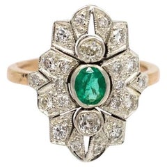 Vintage ring with diamonds and emerald, Austria-Hungary, early 20th century.