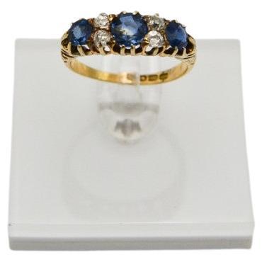 Round Cut Antique ring with sapphires and diamonds, Great Britain, mid-19th century. For Sale
