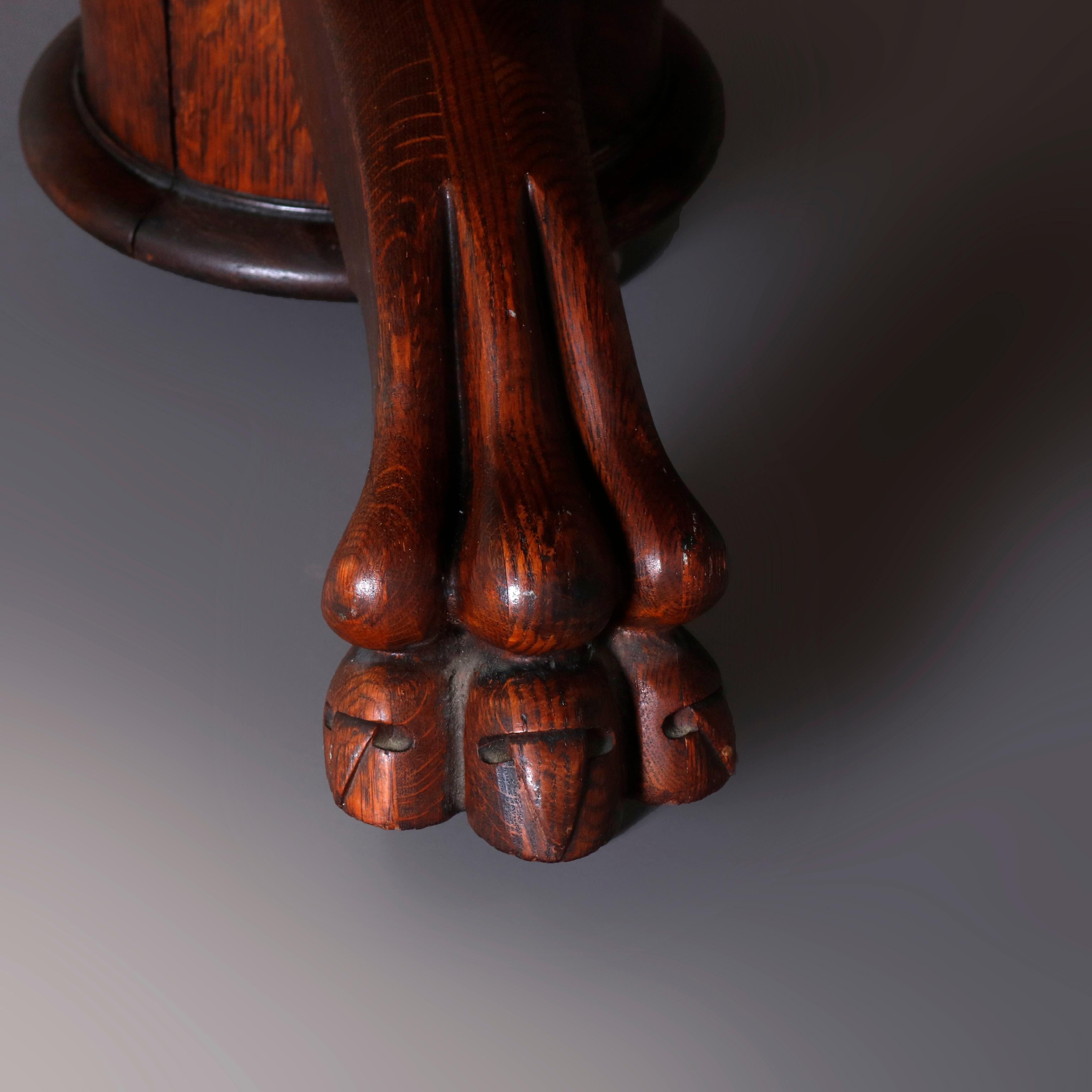 Victorian Antique R.J. Horner Carved Oak Split Pedestal Dining Table with Paw Feet