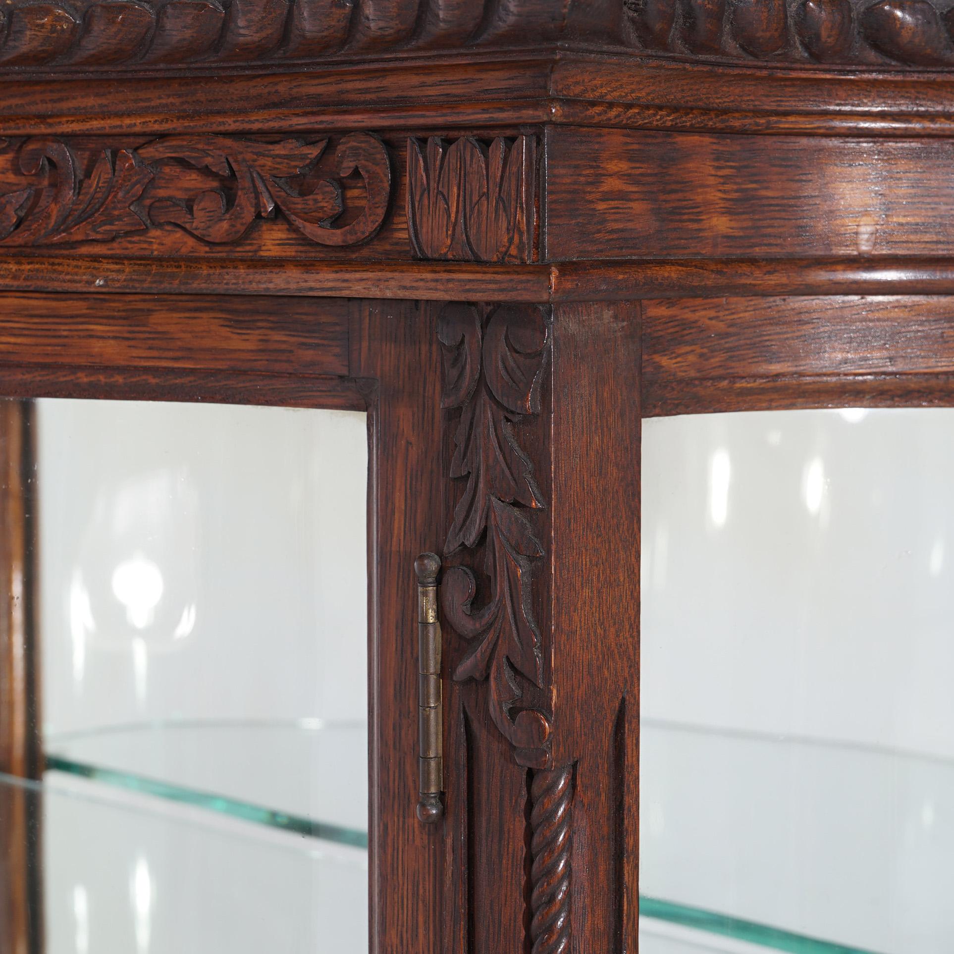 ***Reduced Delivery Rates - See Below or Click “Ask The Seller” to Request a Quote***

Antique RJ Horner Diminutive Oak Display Vitrine China Cabinet with Mirrored Back, Curved Glass and Carved Foliate Elements, C1910

Measures- 51''H x 33.5''W x