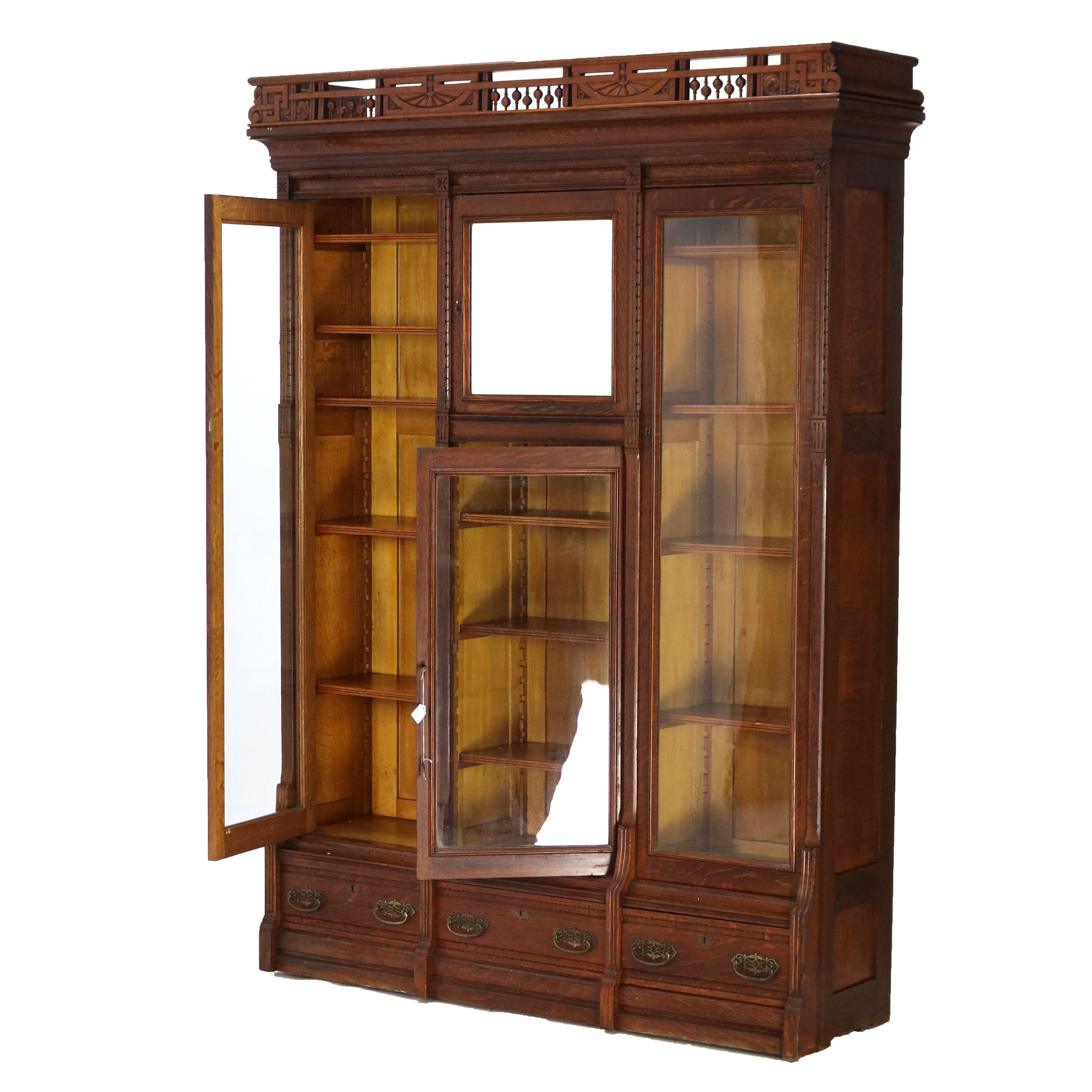 ***Reduced Delivery Rates - See Below or Click “Ask The Seller” to Request a Quote***

Antique RJ Horner Eastlake Style Carved Oak Four Door Three Drawer Bookcase with Incised Decoration, Lower Drawers and Upper Gallery C1910

Measures - 86.25