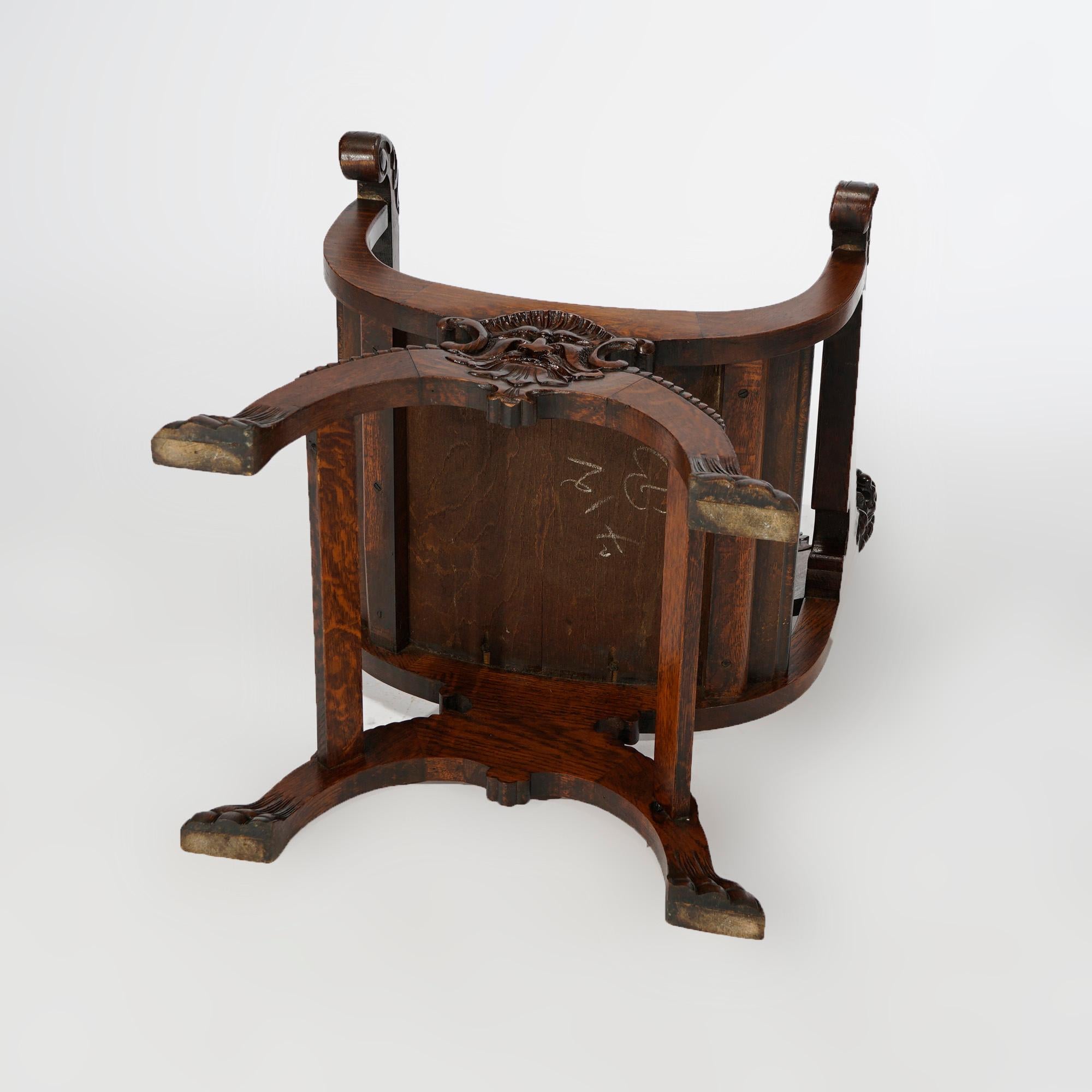 Carved Antique RJ Horner Figural Oak Directors Curule Chair with Lions & Wind God, 1900