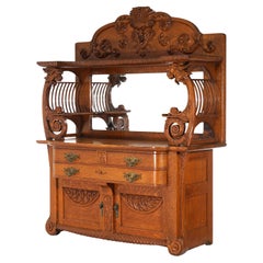 Antique RJ Horner Mirrored & Figural Carved Oak Sideboard with Wind God C1900