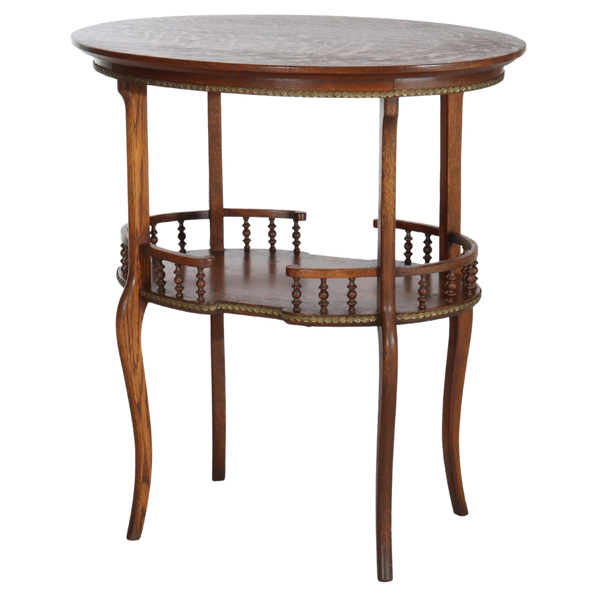 Antico tavolo occasionale ovale RJ Horner in Oak e Ormolu con guida a fuso del 1900 ca. in vendita