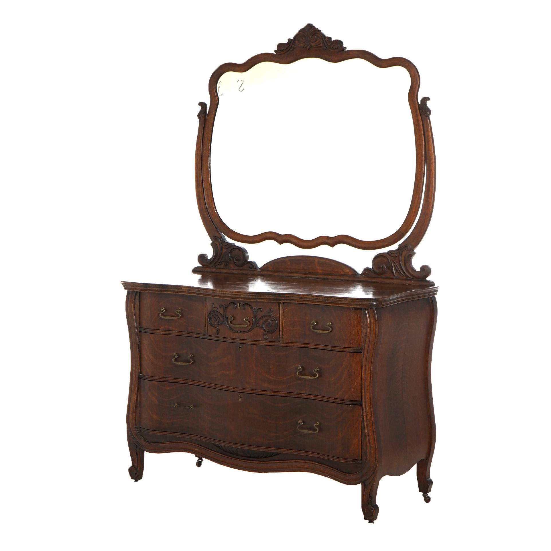 ***Reduced Delivery Rates - See Below or Click “Ask The Seller” to Request a Quote***

Antique Bombe Serpentine & Mirrored Oak Dresser with Foliate Elements in the Manner of RJ Horner C1910

Measures - 75