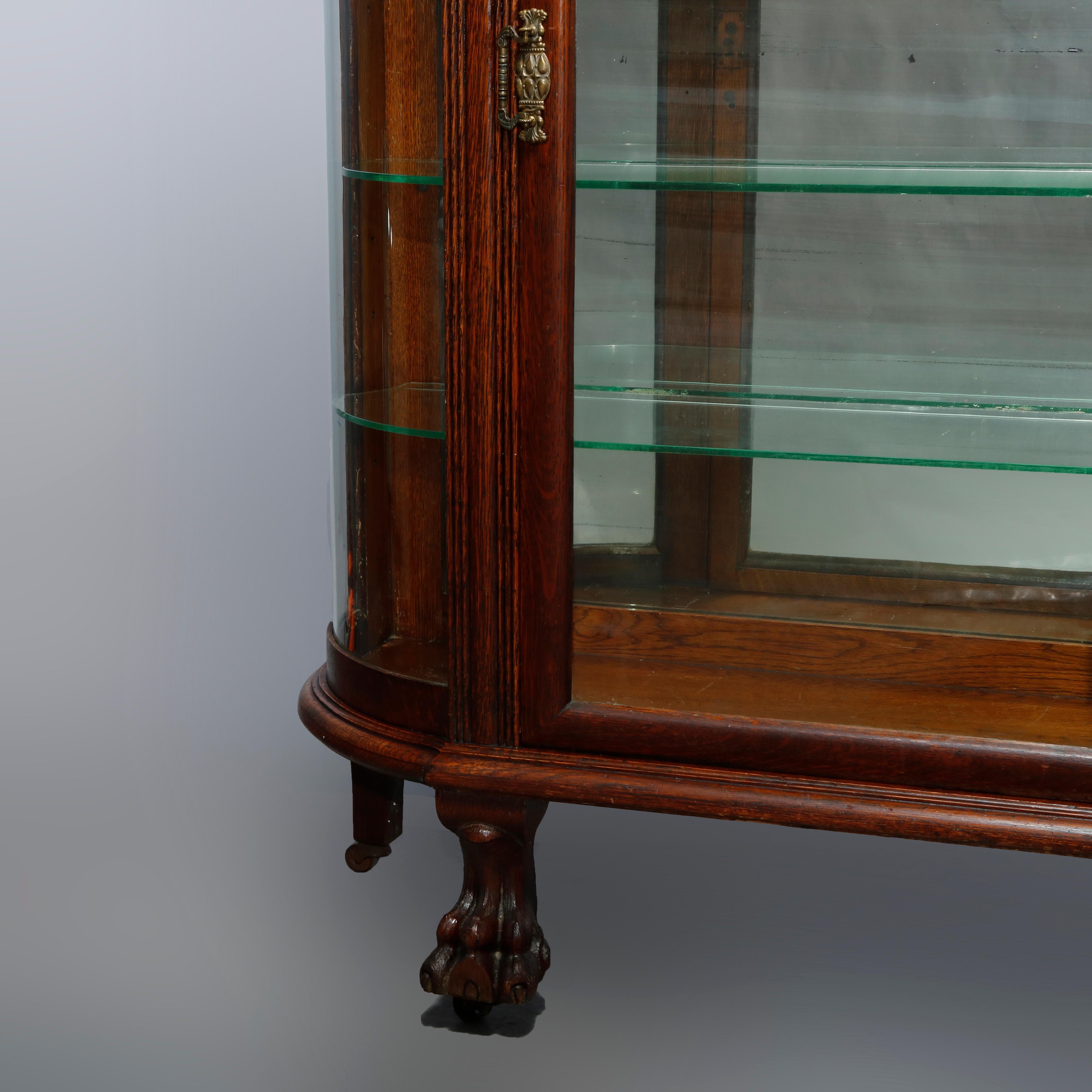 antique oak curved glass china cabinet with claw feet