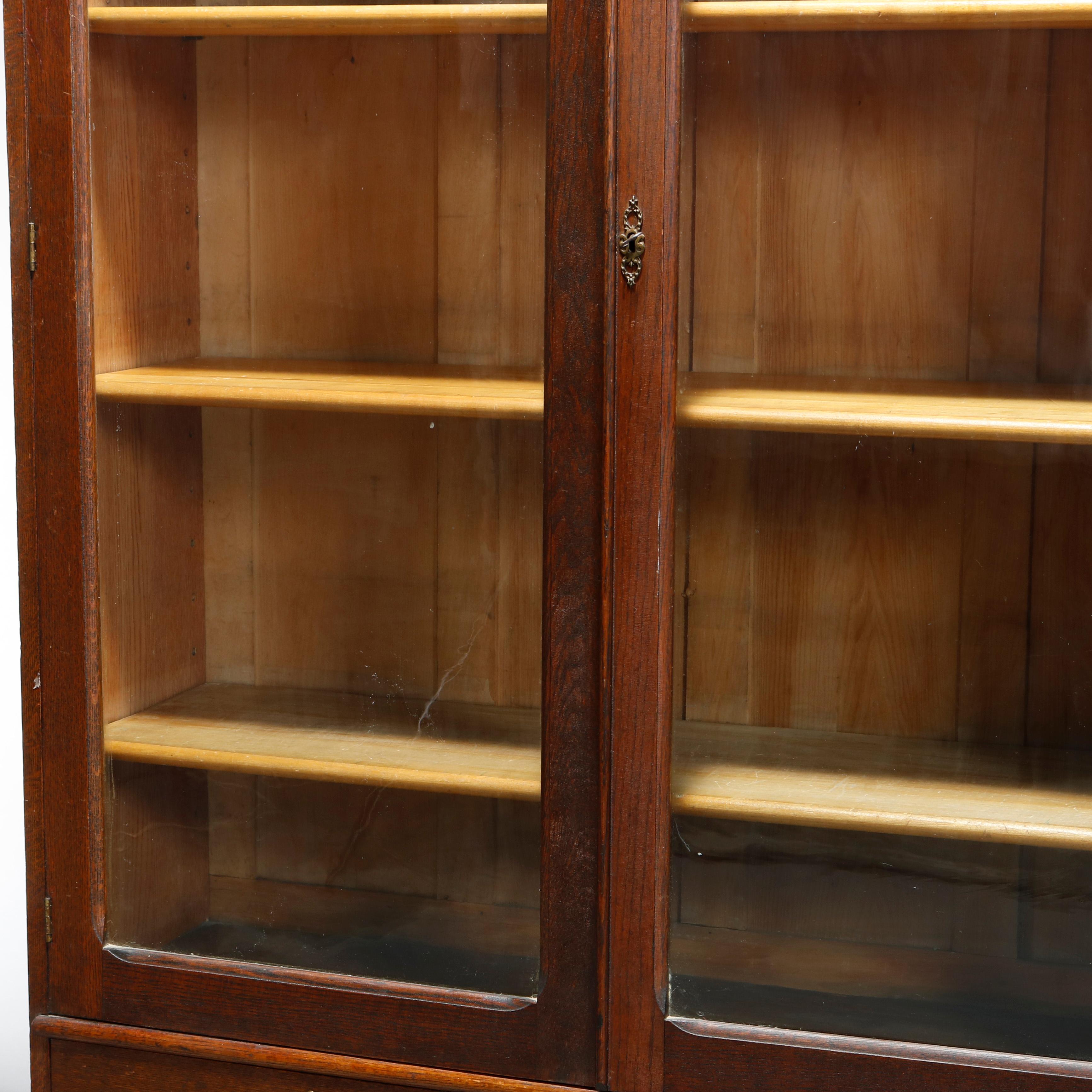 Glass Antique RJ Horner School Oak Two Door Bookcase Over Two Drawers, Circa 1900