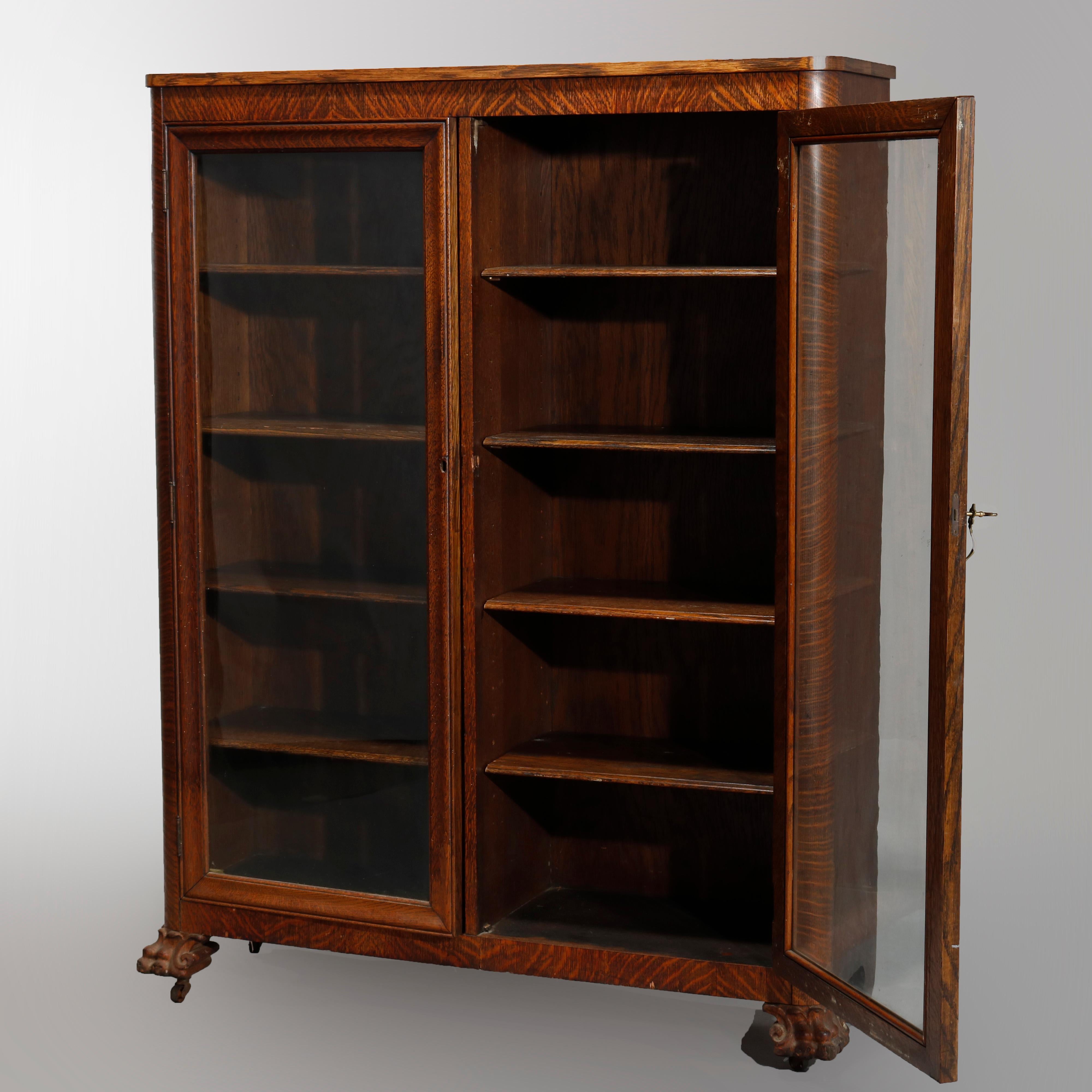 American Antique RJ Horner Style Oak Claw Foot Double Door Bookcase, circa 1910
