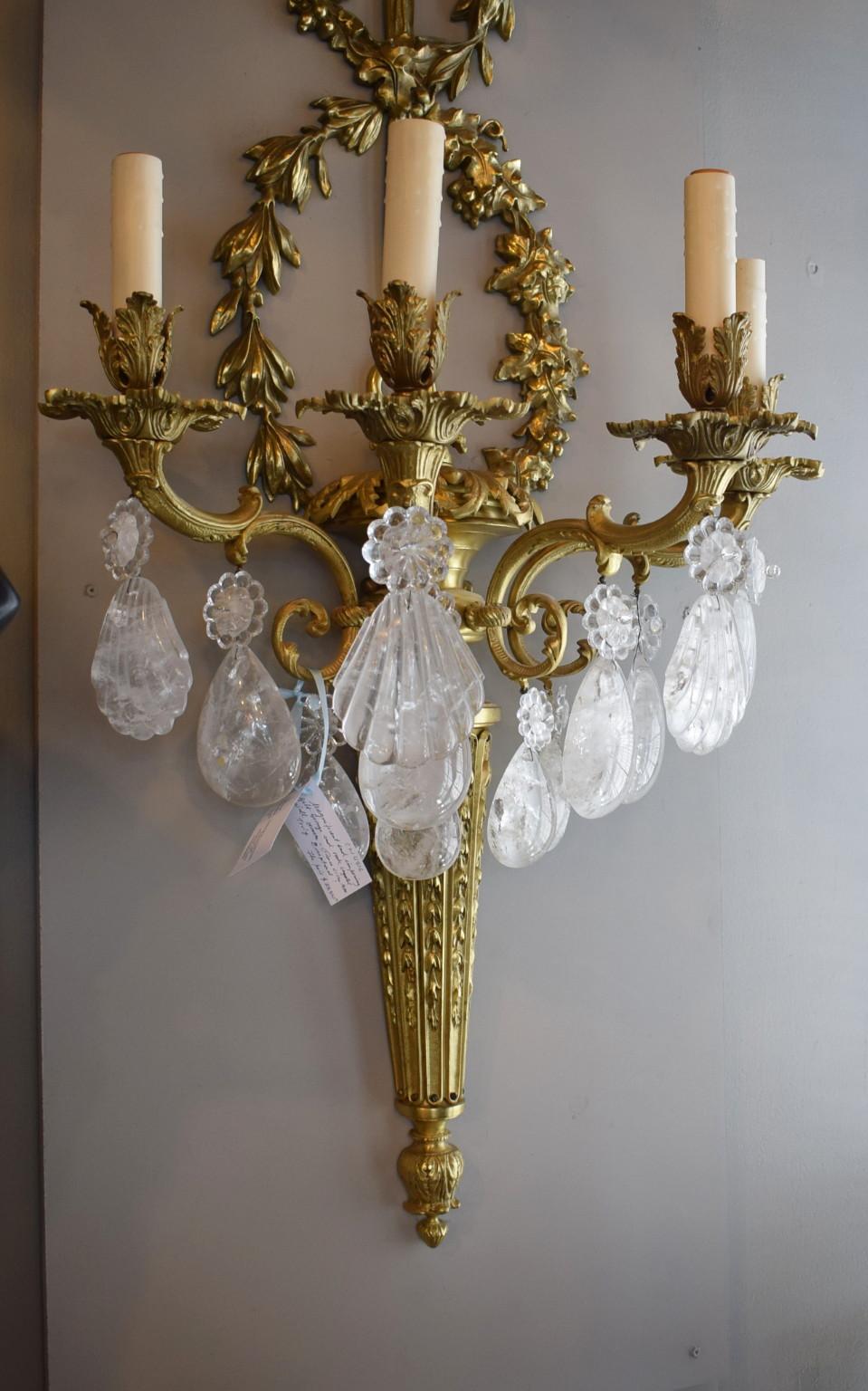 Magnificent and imposing pair of gilt bronze and rock crystal wall sconces, truly exceptional! Four lights each.
CW4516