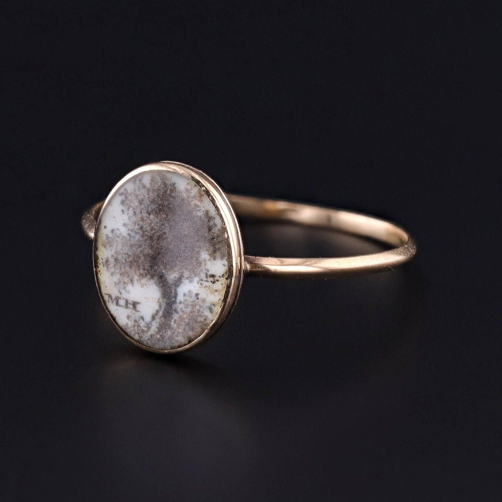 Antique Tree of Life Ring: This special ring features a Tree of Life of macerated hair set beneath rock crystal with the initials M.H. off to the side. The face of the ring dates to the late Georgian era (circa 1830) and it is set in 18k gold. The