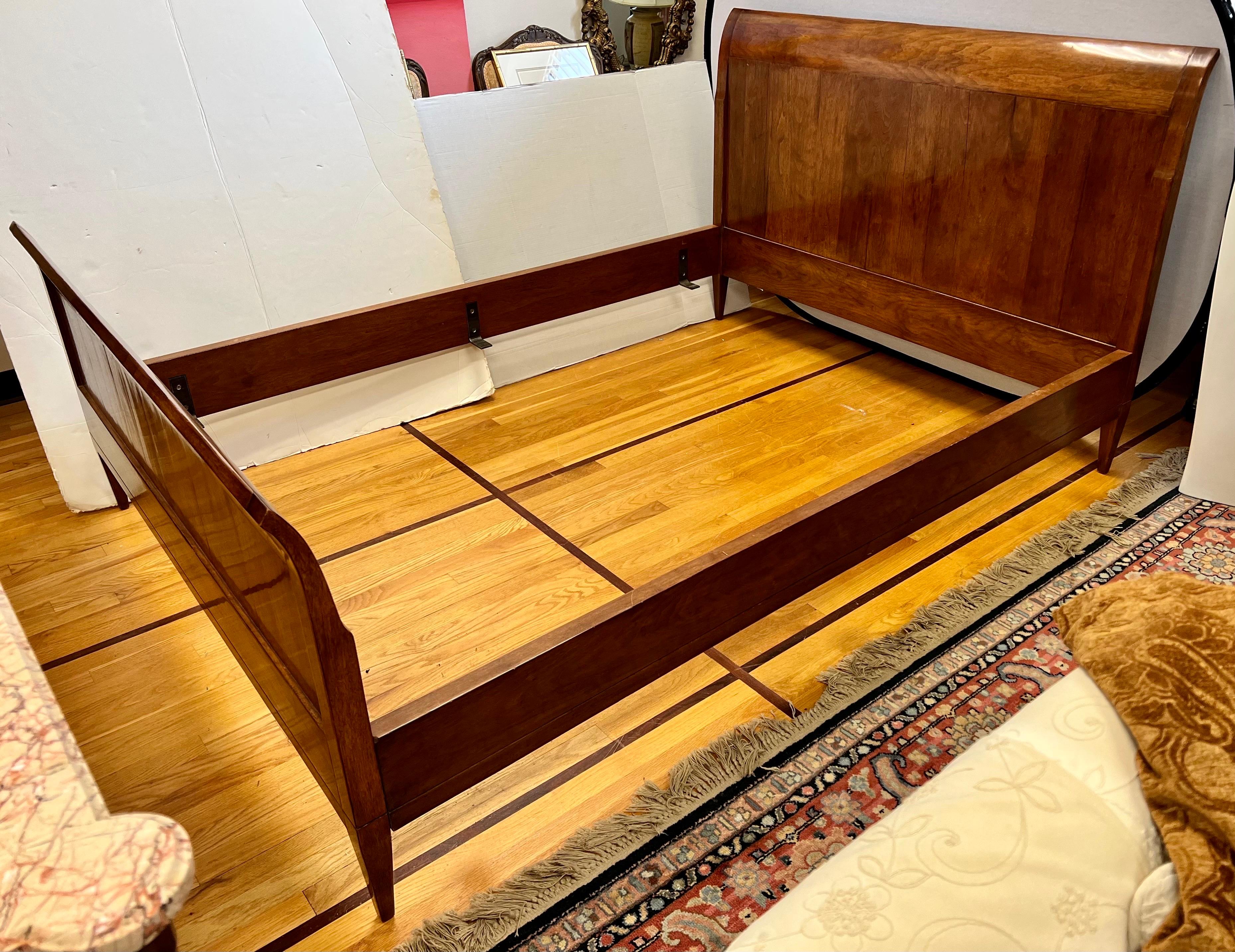 Antique solid rock maple sleighbed with headboard, footboard and side rails. Has attached metal supports. The finish has aged to a beautiful golden hue.

Measures: 64” wide by 43” tall at the headboard x 84” long and the footboard is 30” tall.