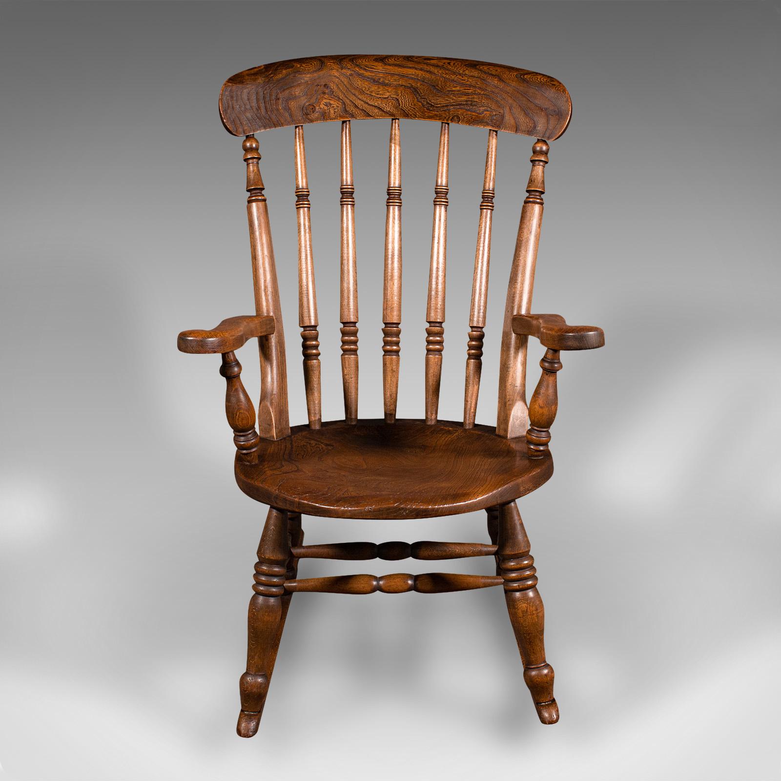 
This is an antique spindle back rocker. An English, beech and elm country house rocking chair, dating to the late Victorian period, circa 1900.

Superb craftsmanship to this traditionally appealing rocker
Displaying a desirable aged patina and in