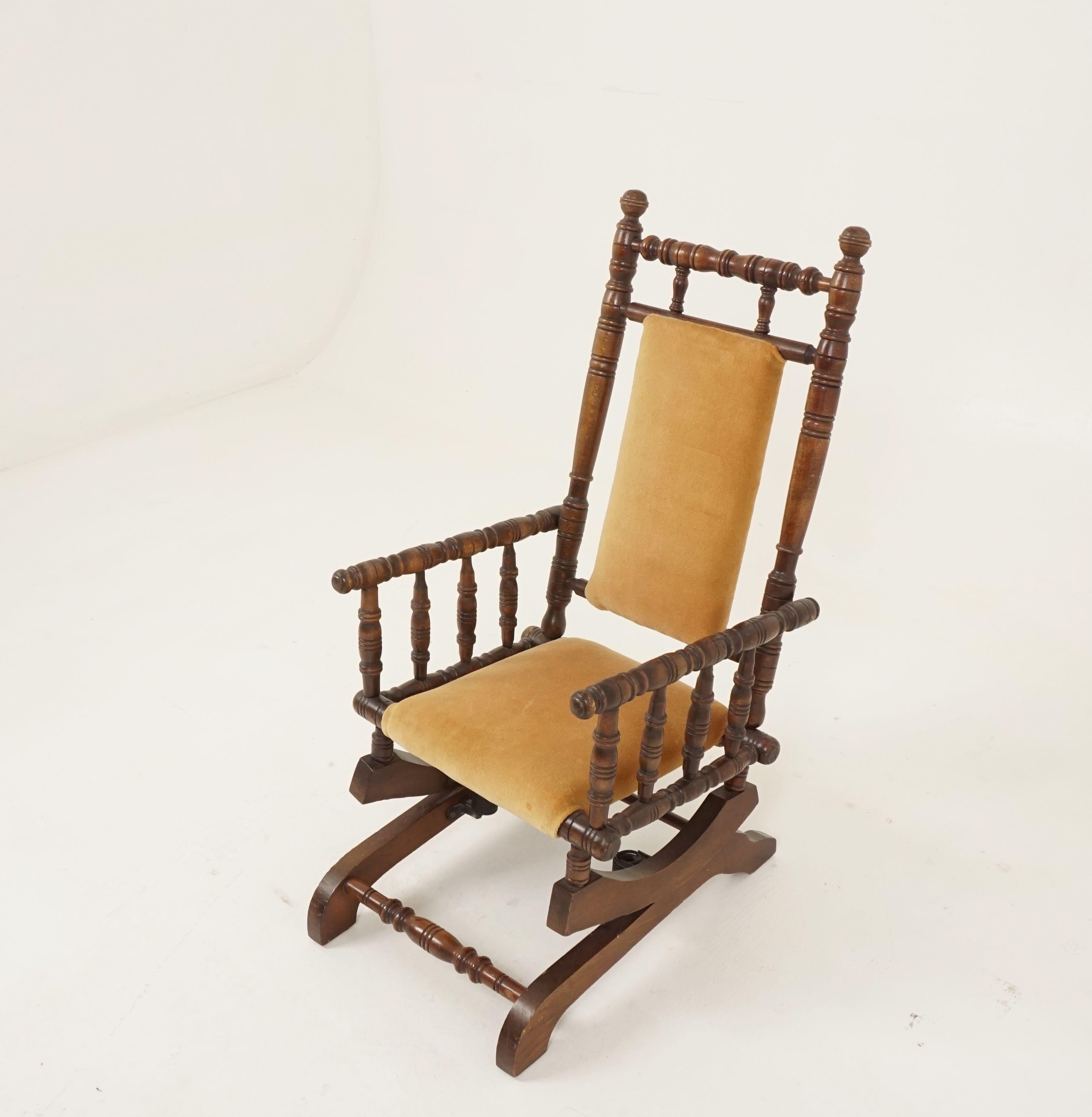 Antique rocking chair, childs chair, beechwood, American 1880, H582

American 1880
Solid beechwood
Original finish
Turned supports with finials on top
Velvet upholstered seat and back that has brass studded detail
The static platform base has a pair