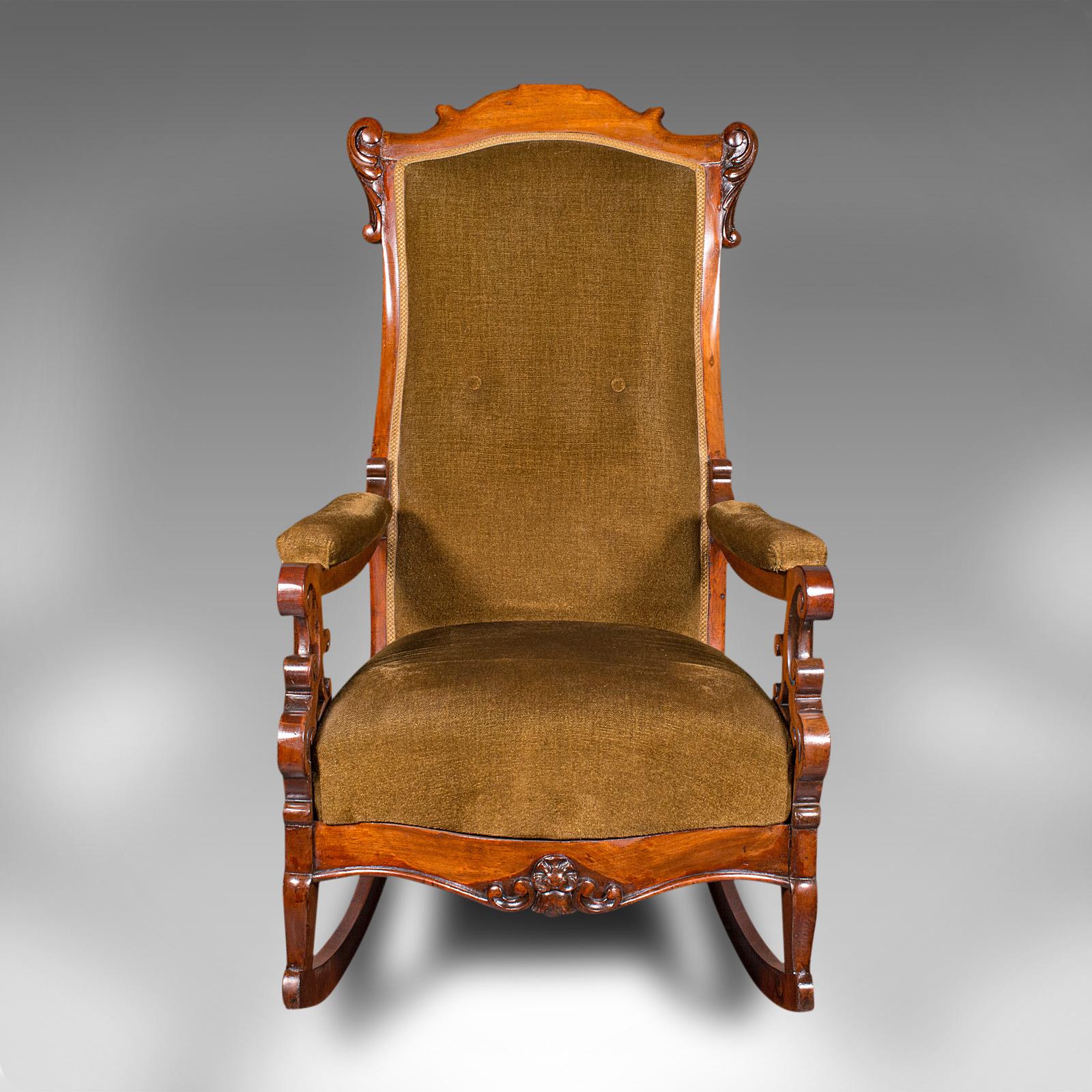This is an antique rocking chair. An English, walnut framed armchair rocker, dating to the late Victorian period, circa 1880.

Relax and soothe the day away with this attractive rocker
Displays a desirable aged patina and in very good order
Select
