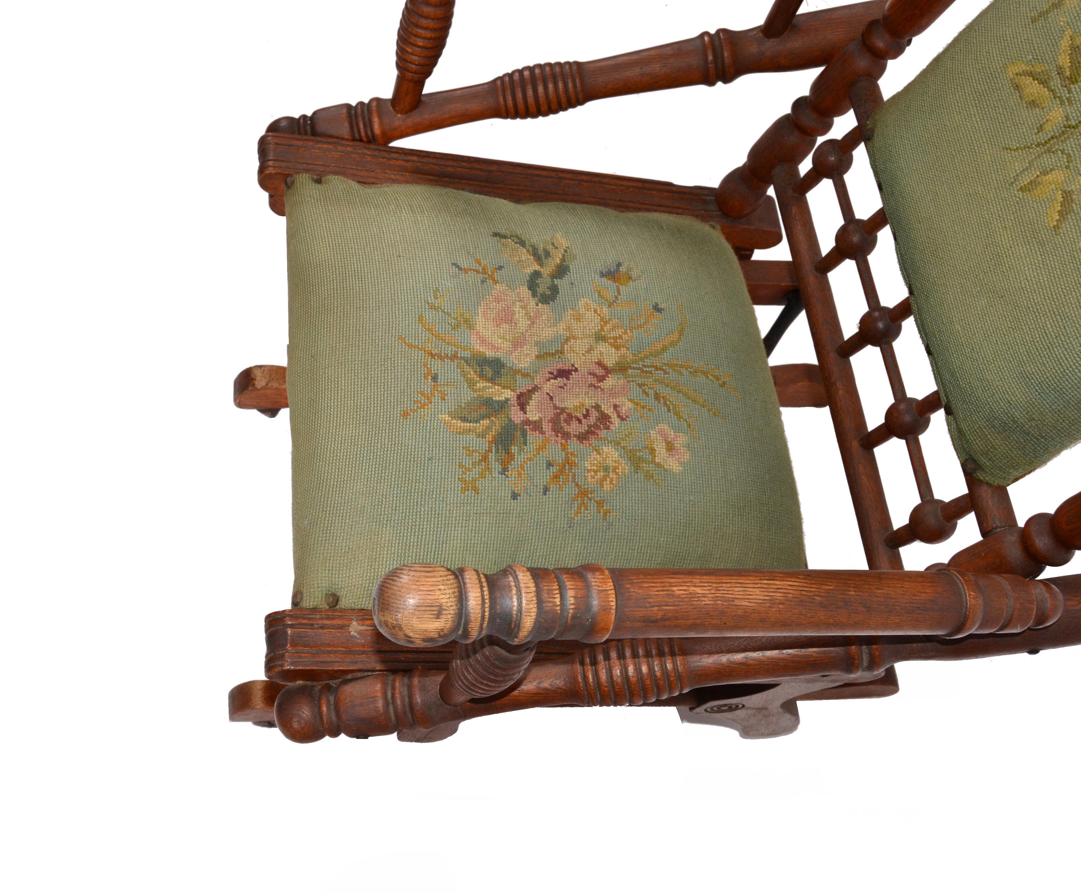 Rococo Antique Rocking Chair Hand Carved and Turned Walnut Wood Needlepoint Upholstery For Sale