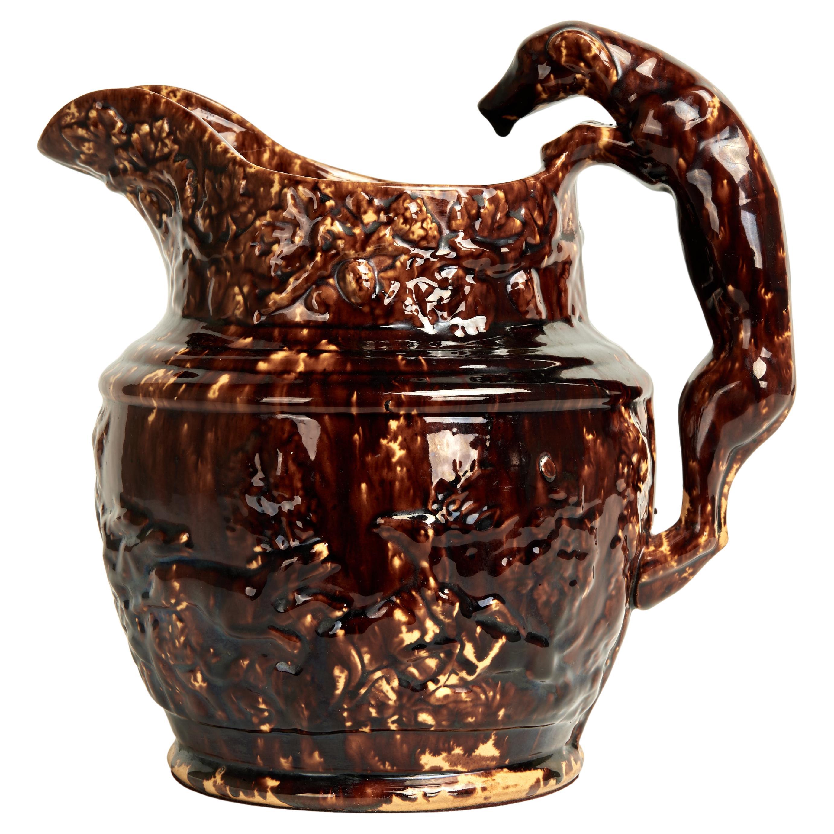 Antique Rockingham Pottery Pitcher with Dog Handle