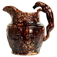 Antique Rockingham Pottery Pitcher with Dog Handle