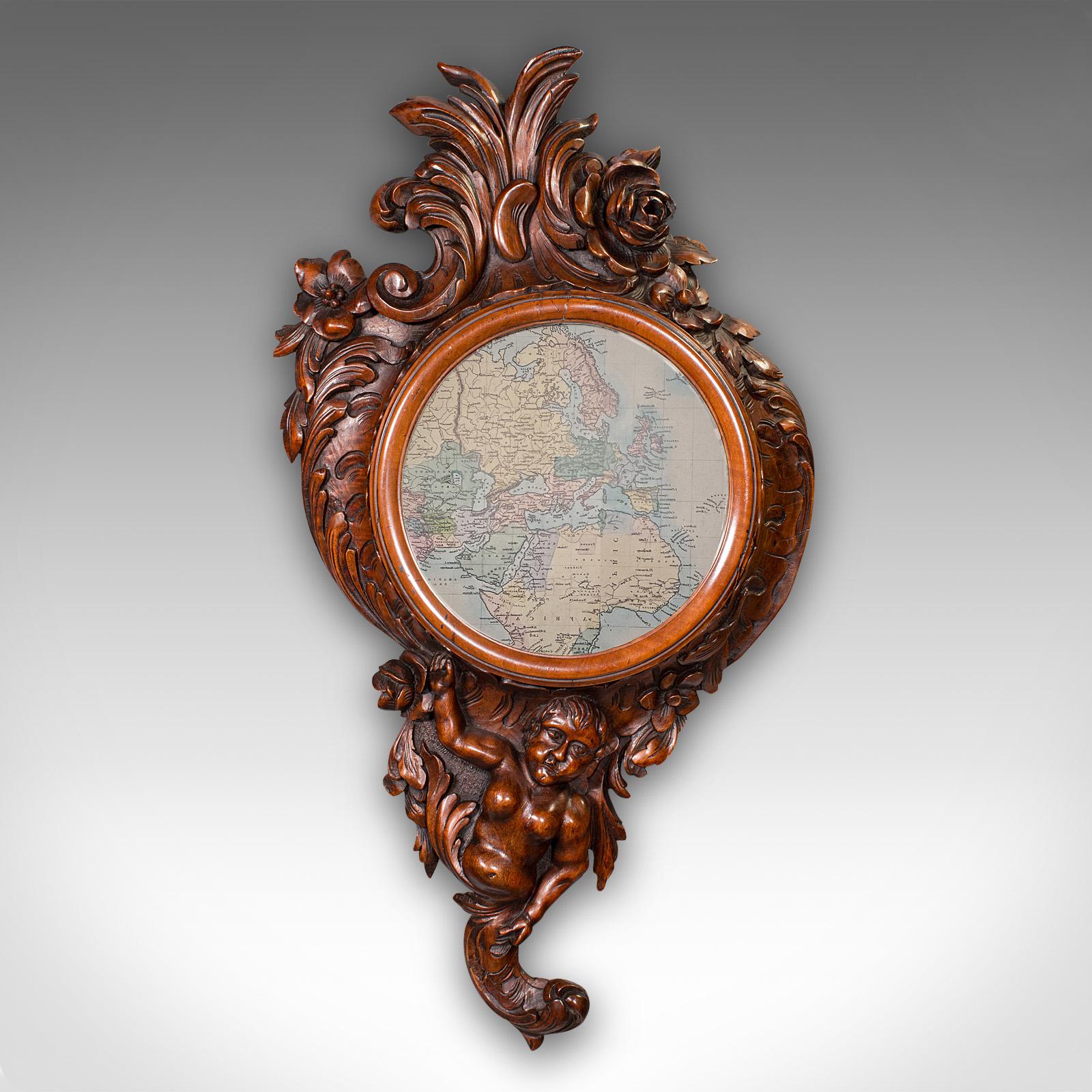 This is a superb antique Rococo mirror of Italian craftsmanship in neoclassical taste, dating to the late Victorian period, circa 1900. A richly decorative wall mirror with superb detail and fine quality throughout.

Striking Italianate mirror with