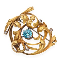 Antique Rococo Revival 18k Yellow Gold Blue Zircon and Rose Cut Diamond Brooch