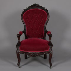 Antique Rococo Revival Carved Walnut and Velvet Button Back Parlor Armchair