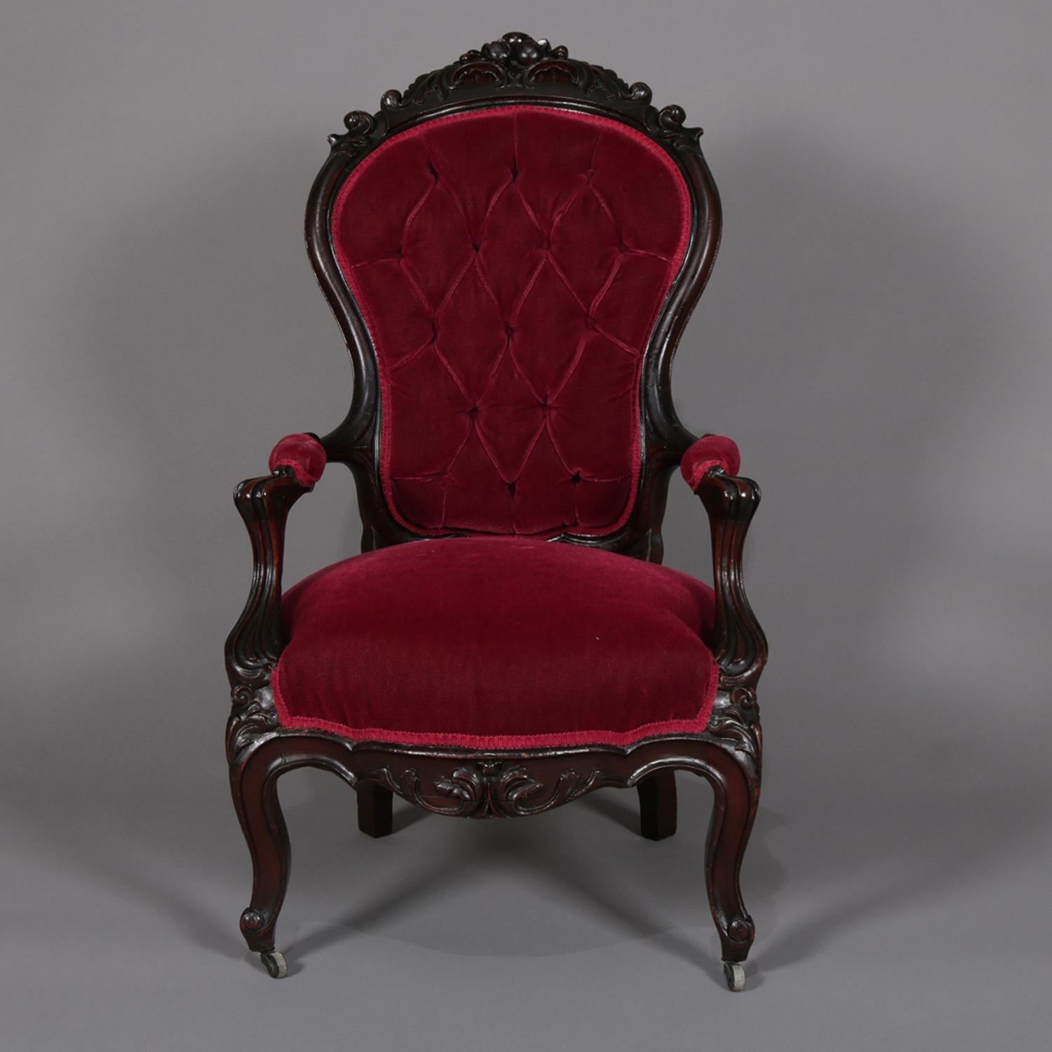 American Antique Rococo Revival Carved Walnut and Velvet Button Back Parlor Armchair