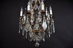Antique Rococo style brass and crystal chandelier