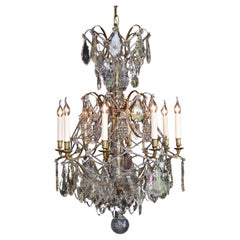 Antique Rococo style brass and crystal chandelier