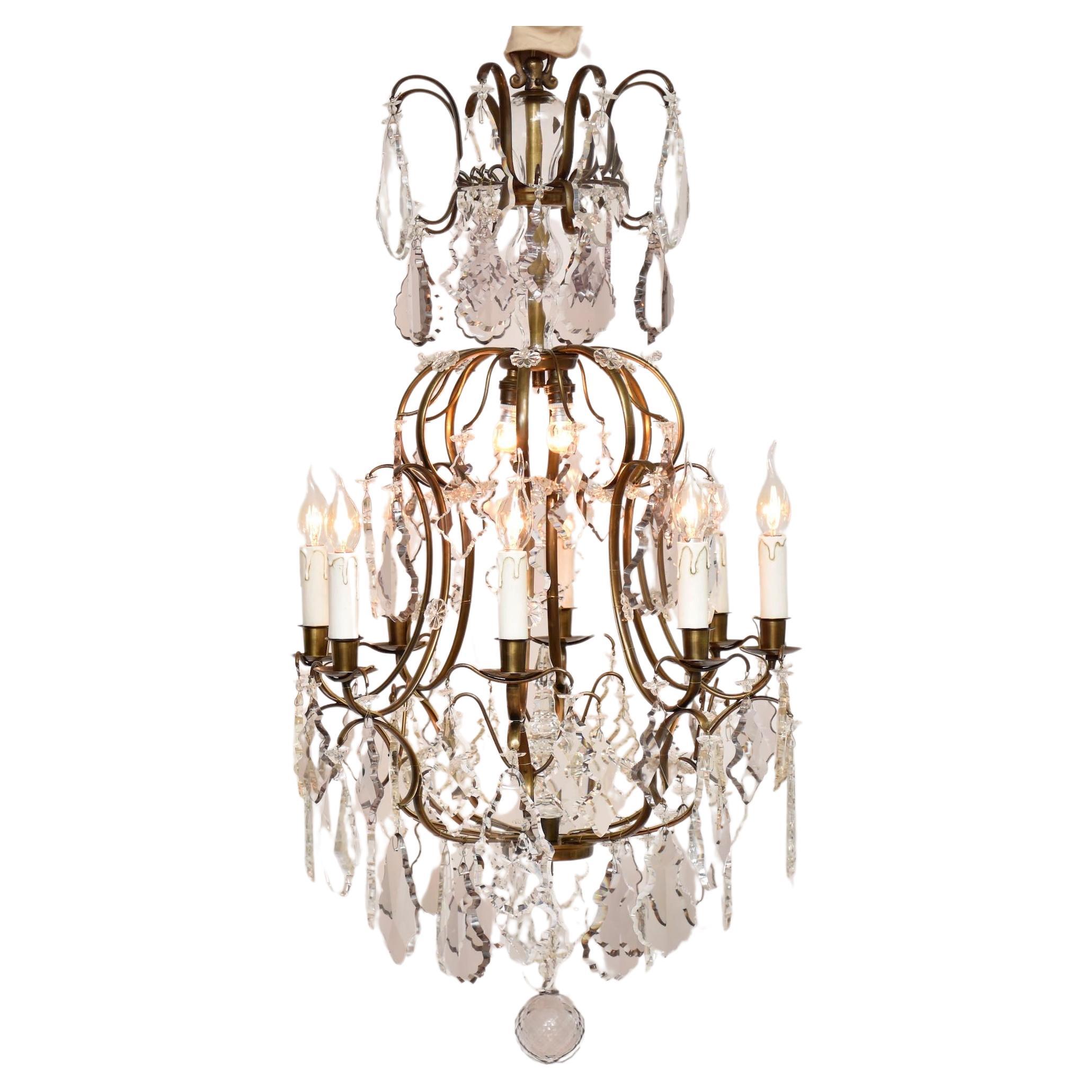 Antique Rococo style brass and crystal chandelier