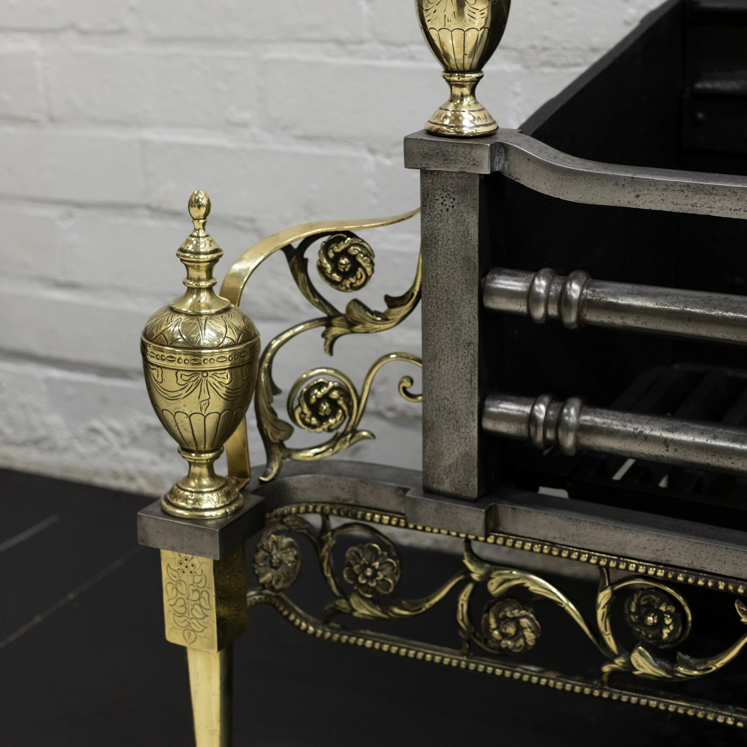 20th Century Antique Rococo Style Polished Steel and Brass Fire Basket with Griffins For Sale