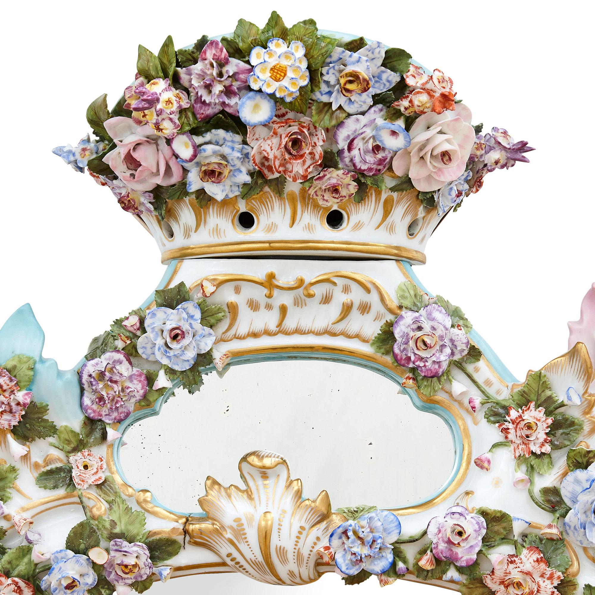 Antique Rococo style porcelain mirror by Meissen
German, 19th century 
Measures: Height 94cm, width 66cm, depth 14cm

Manufactured by the renowned Meissen Porcelain factory, which was established in 1710 and patronised by the greatest of