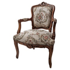 Antique rococo women's armchair